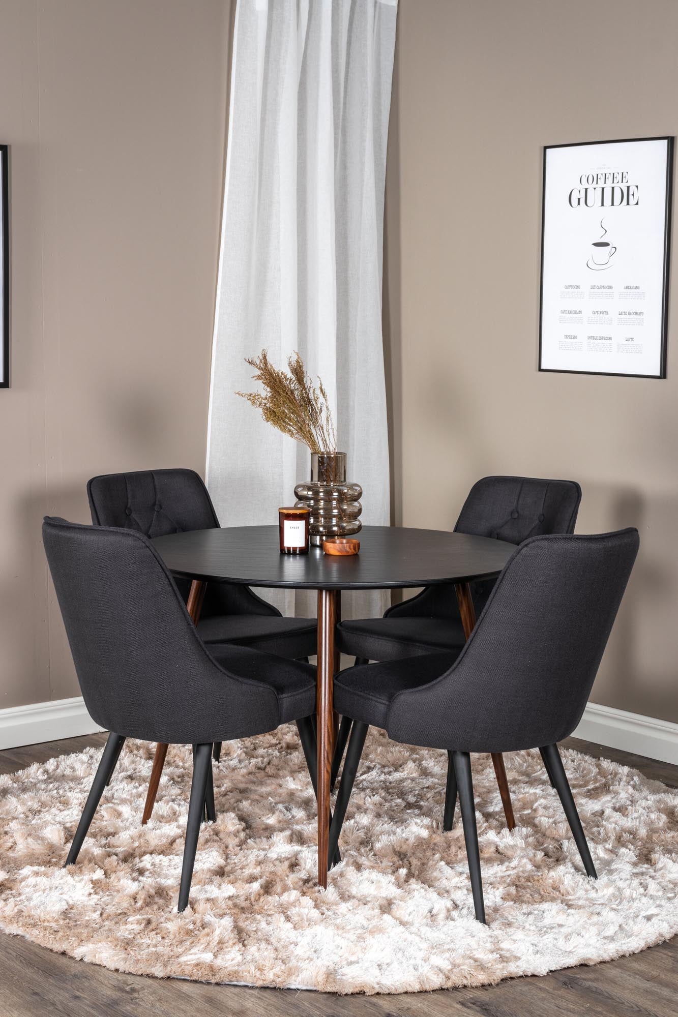 Erleben Sie das Plaza Esszimerset + Velvet Deluxe von Venture Home: eleganter runder Esstisch mit 100 cm Durchmesser, ideal für gesellige Runden und stilvolle Einrichtung.