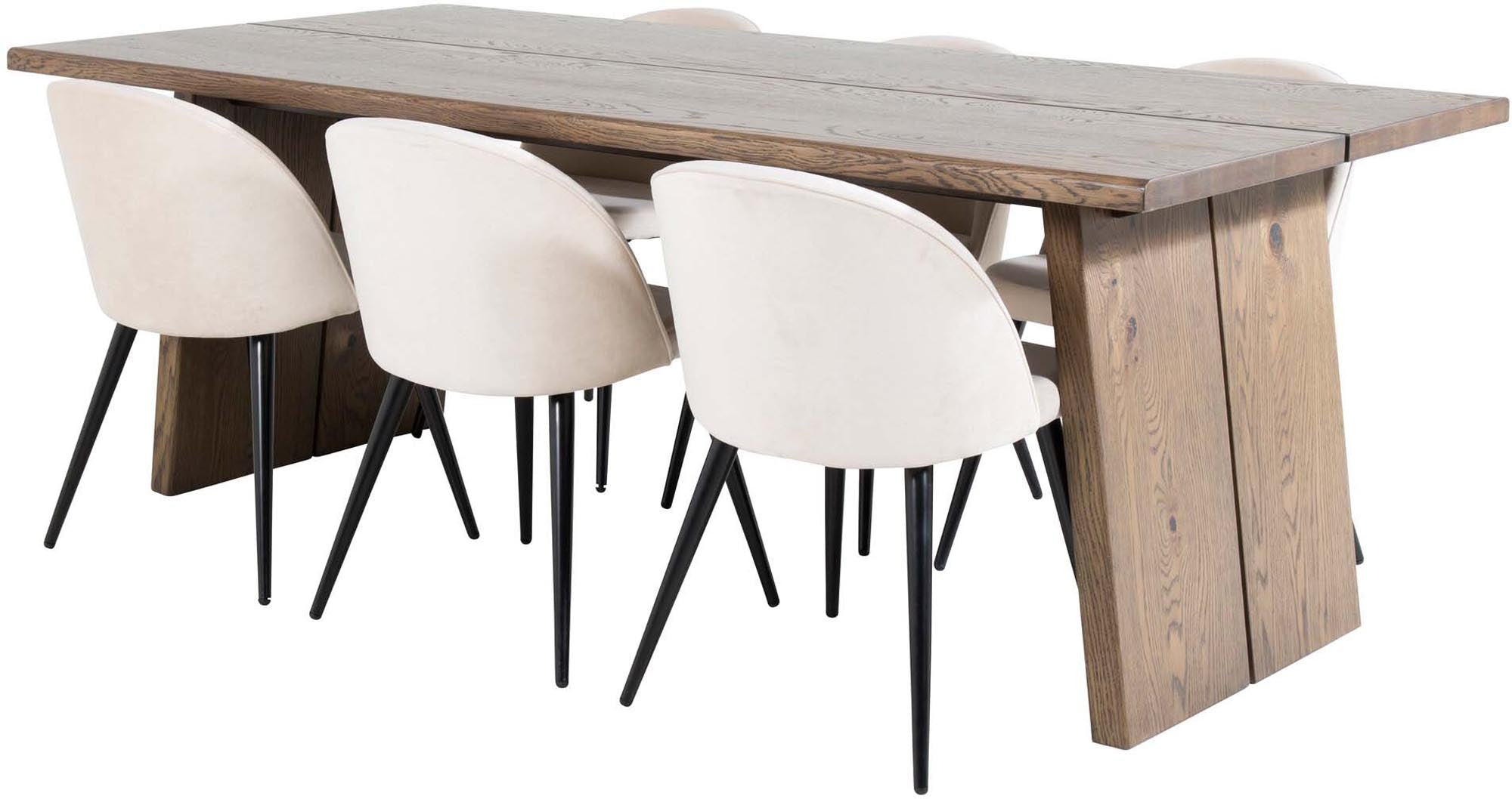 Entdecken Sie das Logger Esszimmerset von Venture Home: Ein ausziehbarer Tisch in rustikaler Holzoptik und elegante Samtstühle für einladende Essmomente.