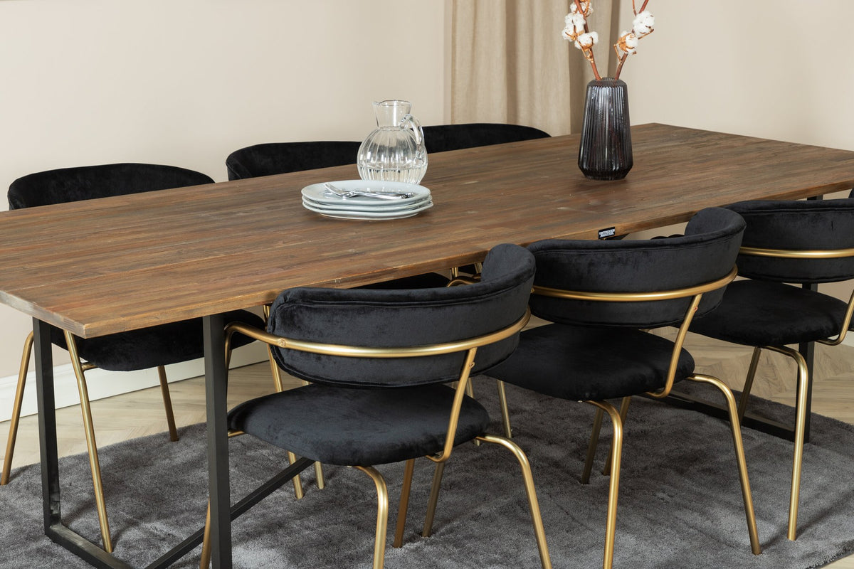 Esszimmerset Padang mit Arrow Stühlen: schwarzer Stahltisch mit Teak-Tischplatte, Stühle mit Messing-Pulverbeschichtung und Polyester-Samt-Bezug.