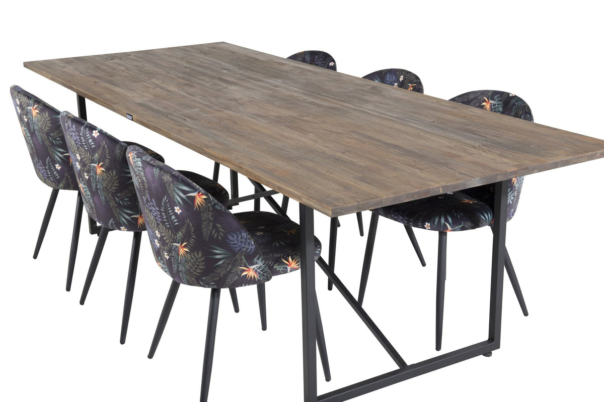 Schwarzes Esszimmerset Padang mit Teak-Tischplatte, Stahlgestell und gepolsterten Velvet-Stühlen mit schwarzem Samtbezug.