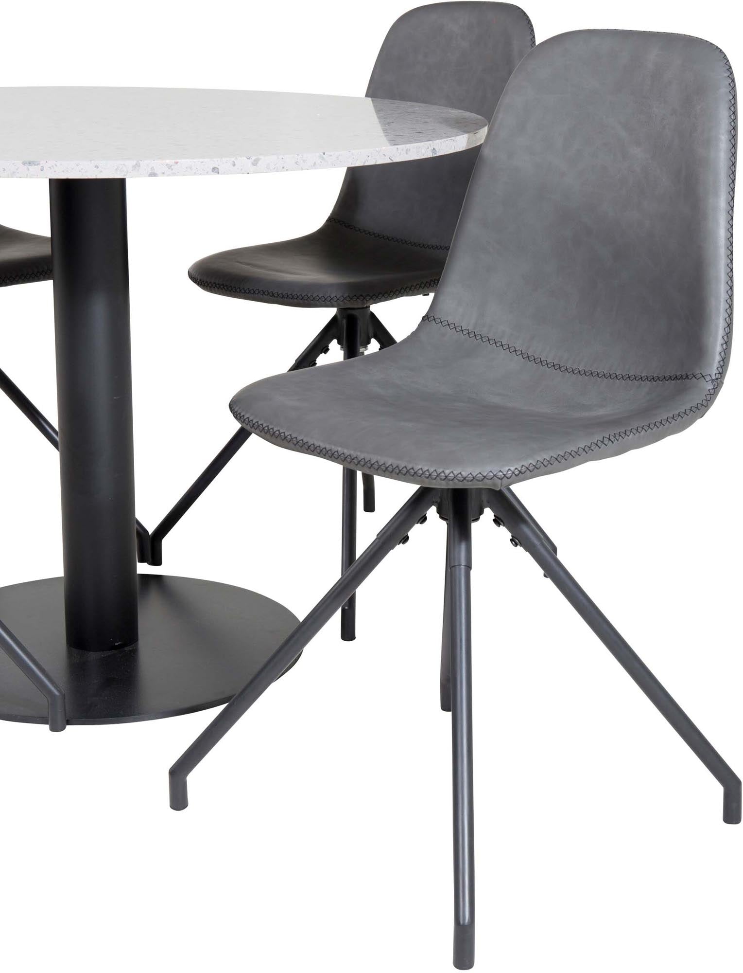 Entdecken Sie das Razzia Esszimmerset + Polar von Venture Home: Eleganz trifft Komfort mit einem runden Tisch und luxuriösen Samtstühlen.