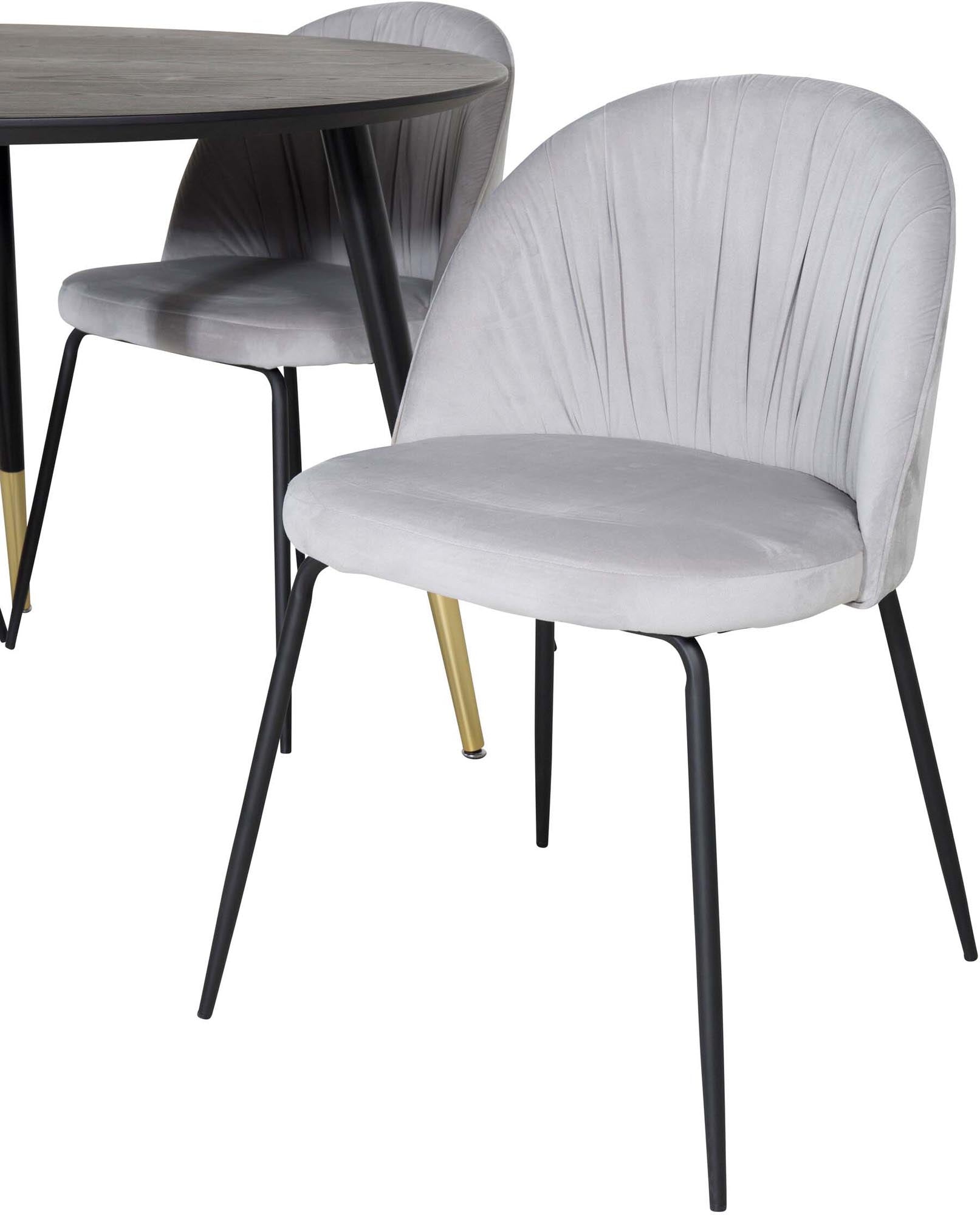 Stilvolles Dipp Esszimmerset mit runden Tisch und 4 Samt-Stühlen. Perfekt für gesellige Abende und festliche Anlässe.