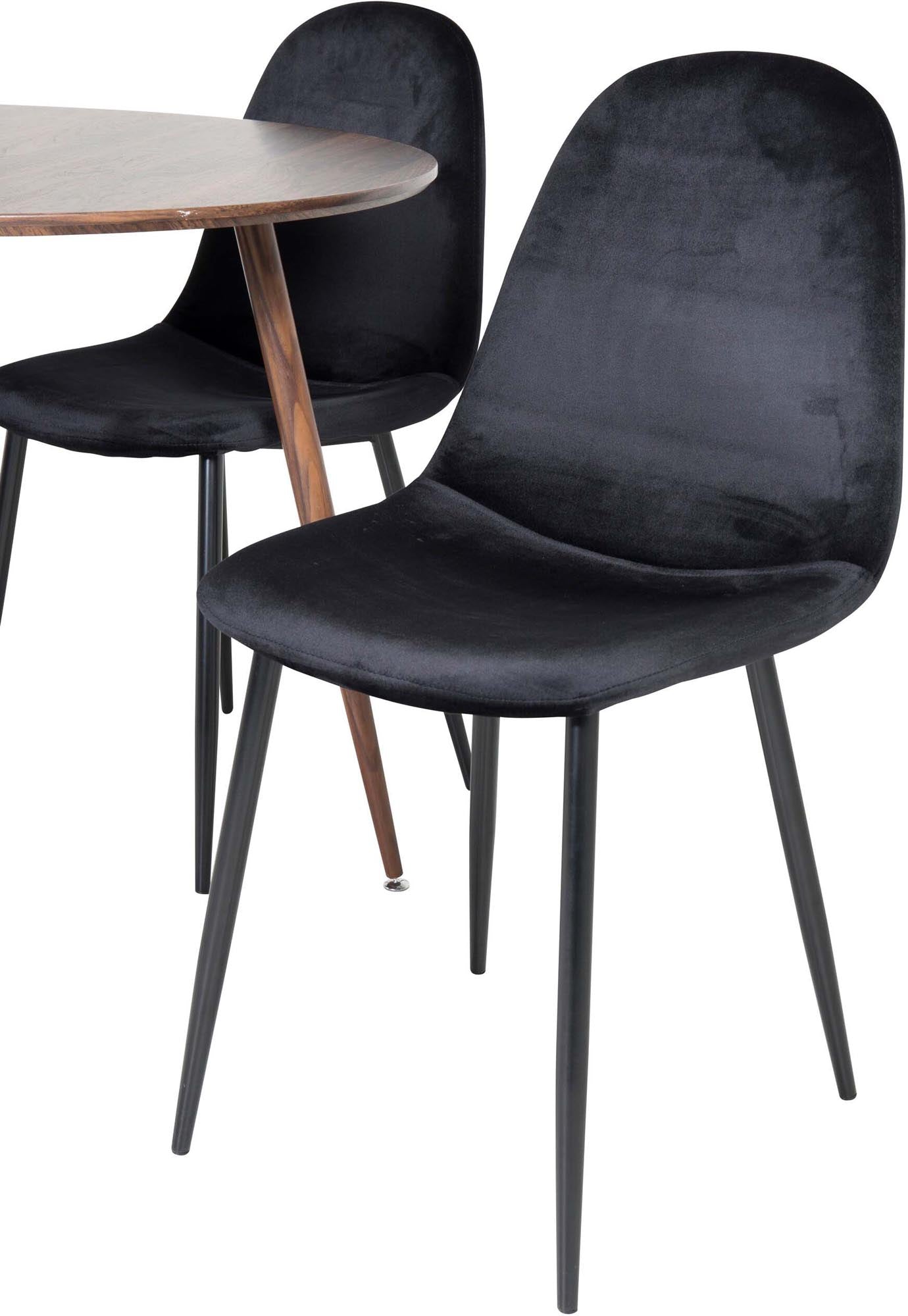 Entdecken Sie das elegante Plaza Esszimmerset von Venture Home: runder 100 cm Tisch und 4 luxuriöse Samtstühle für gesellige Momente.