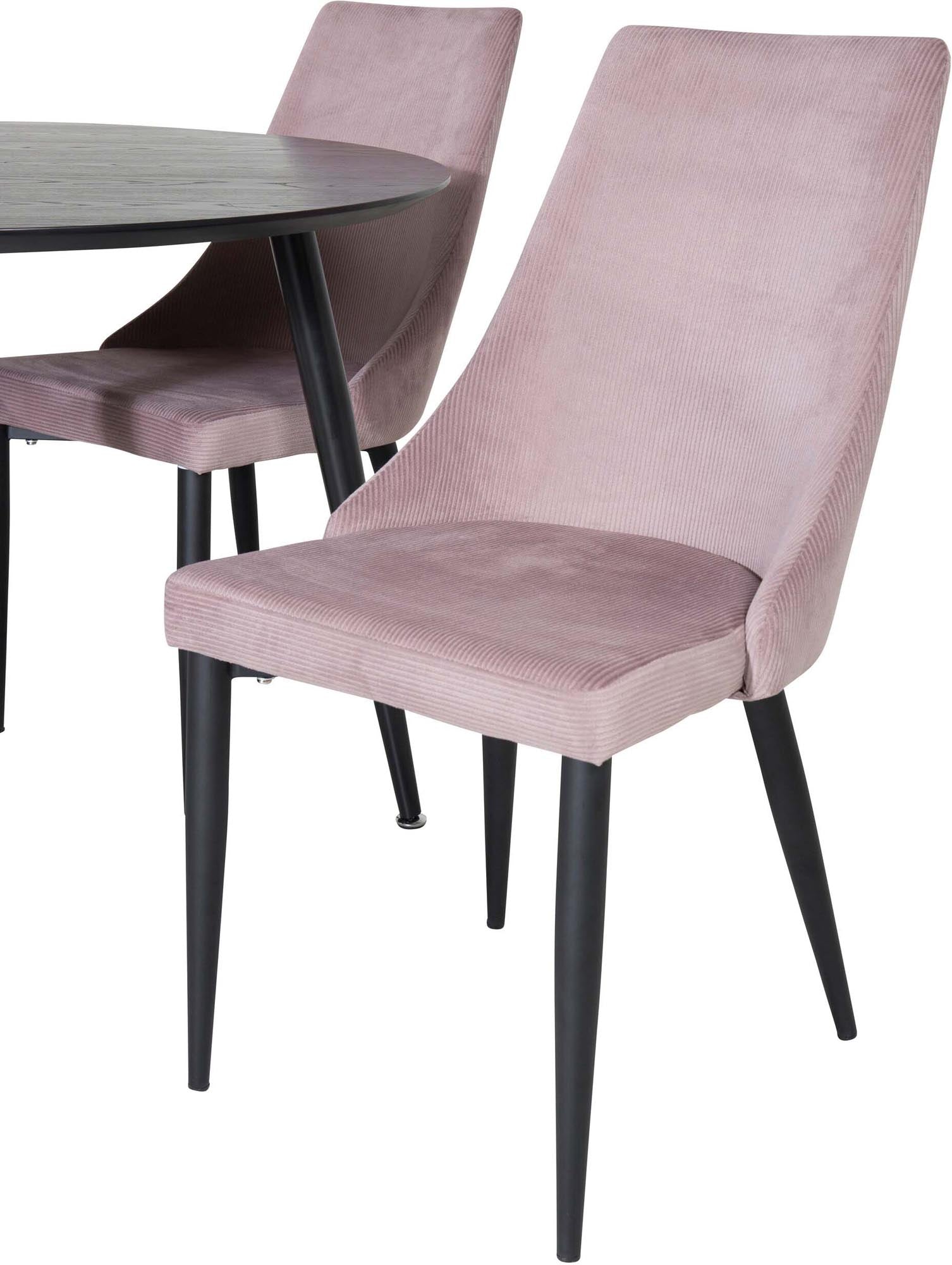 Entdecken Sie das Dipp Esszimmerset + Leone von Venture Home: Stilvoller runder Tisch und bequeme Stühle für gesellige Momente.