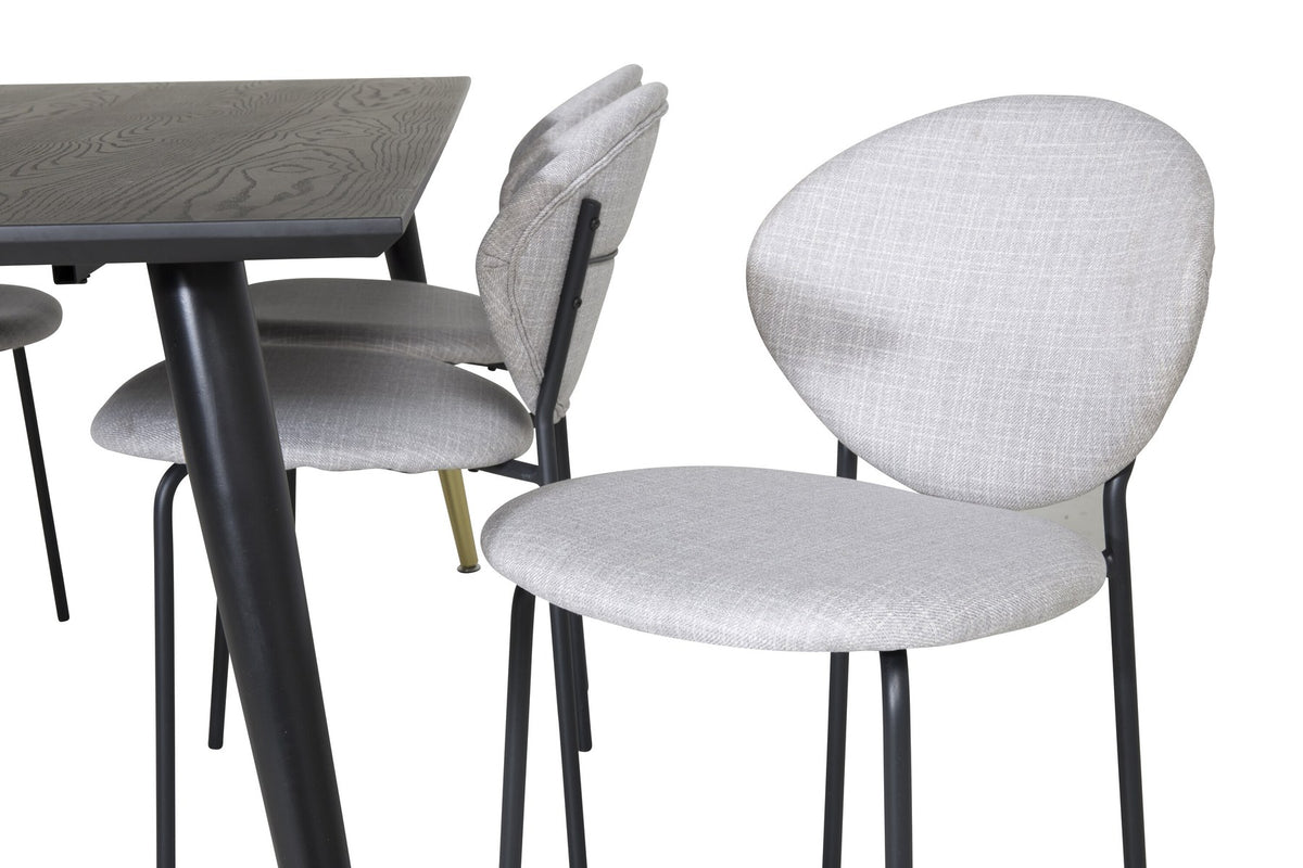 Schwarzes Esszimmerset Dipp mit Vault Stühlen: Tisch mit MDF-Furnierplatte und Stahlbeinen, Stühle mit Polsterbezug und Stahlgestell.