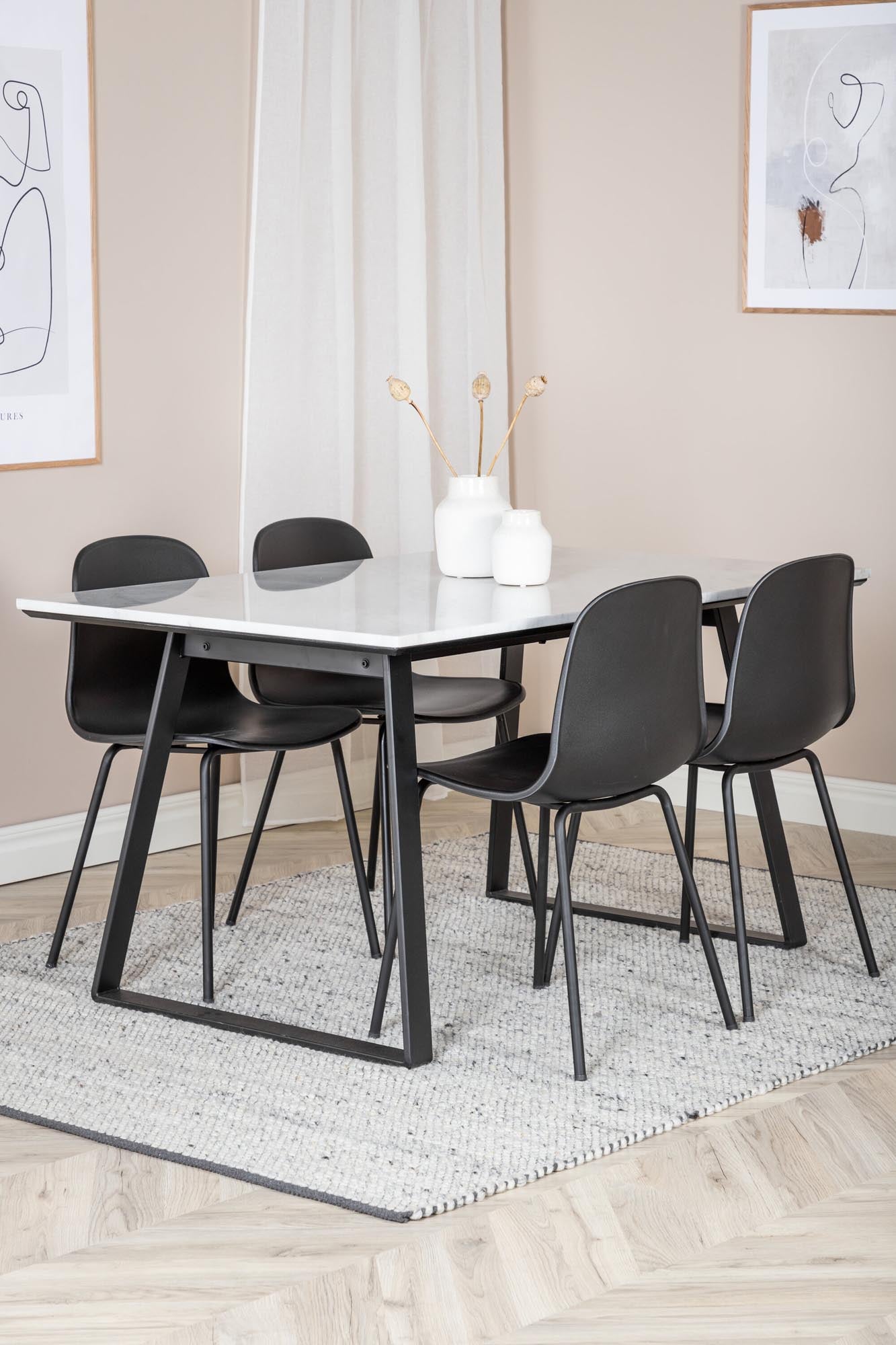 Elegantes Esszimmerset mit 140 cm Tisch und 4 ergonomischen Arctic Stühlen. Ideal für stilvolle Mahlzeiten und gemütliche Zusammenkünfte.