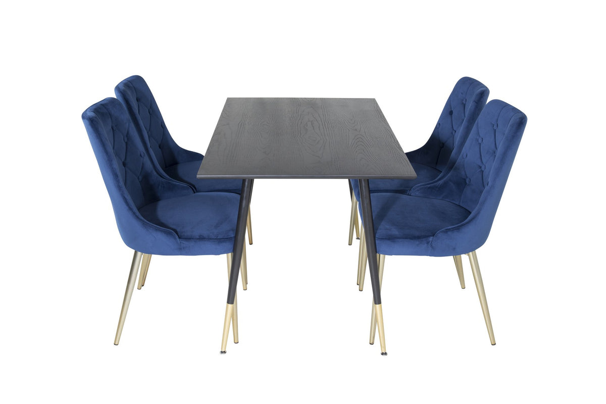 Rechteckiger Esstisch mit schwarzer MDF-Platte und Stahlbeinen, dazu zwei blaue Stühle mit messingfarbener Oberfläche im Esszimmerset.
