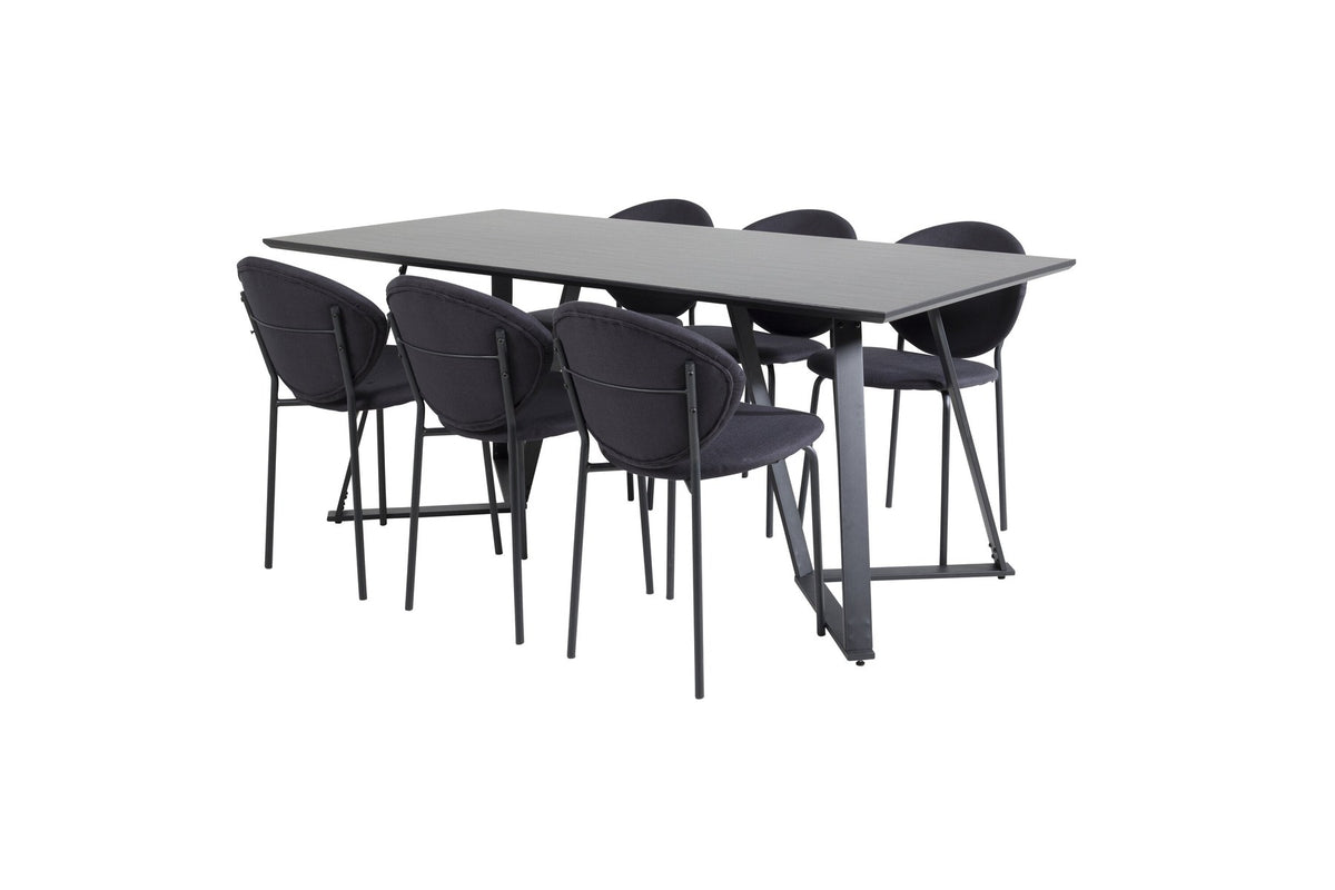 Esszimmerset Marina mit rechteckigem Tisch aus MDF und Papierlaminat sowie Stühlen mit Stahlgestell und Polyesterbezug in Grau.