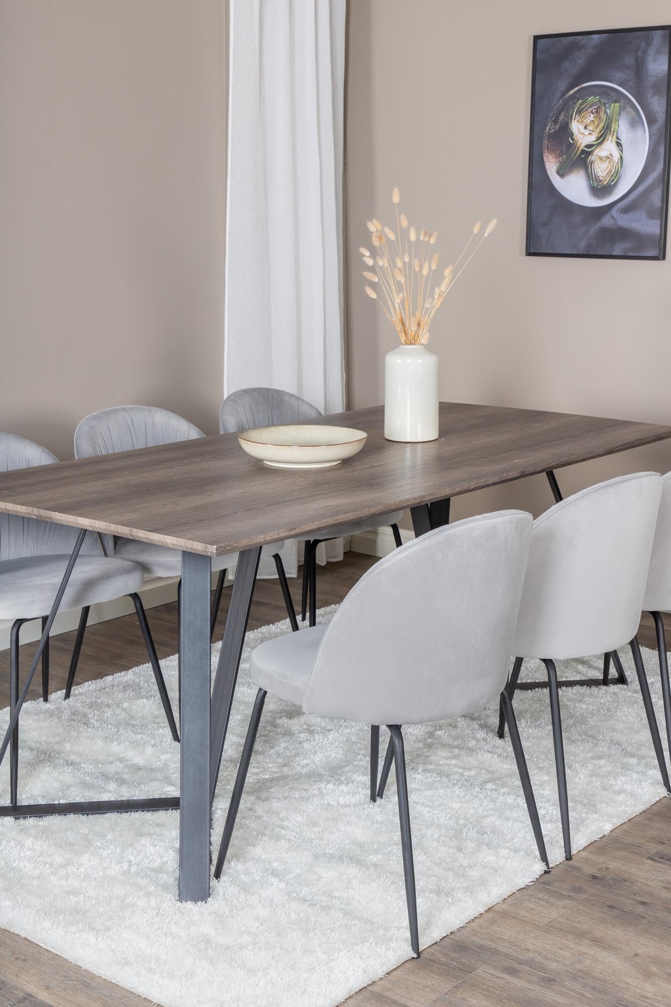 Modernes Esszimmerset Marina: 180 cm Holztisch und 6 ergonomische Samtstühle für höchsten Komfort und stilvolle Essmomente.