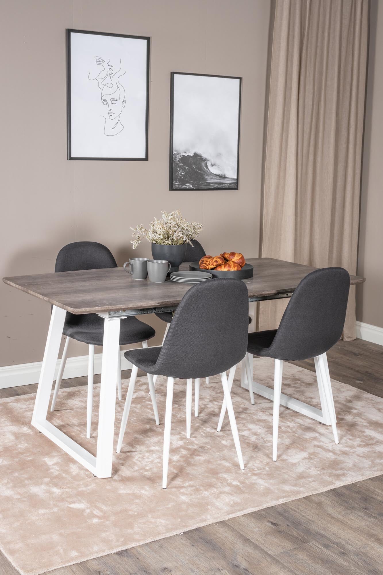 Entdecken Sie das elegante Inca Esszimmerset von Venture Home: Ausziehbar auf 160 cm, perfekt für Feste. Hochwertige Materialien und bequeme Stühle.