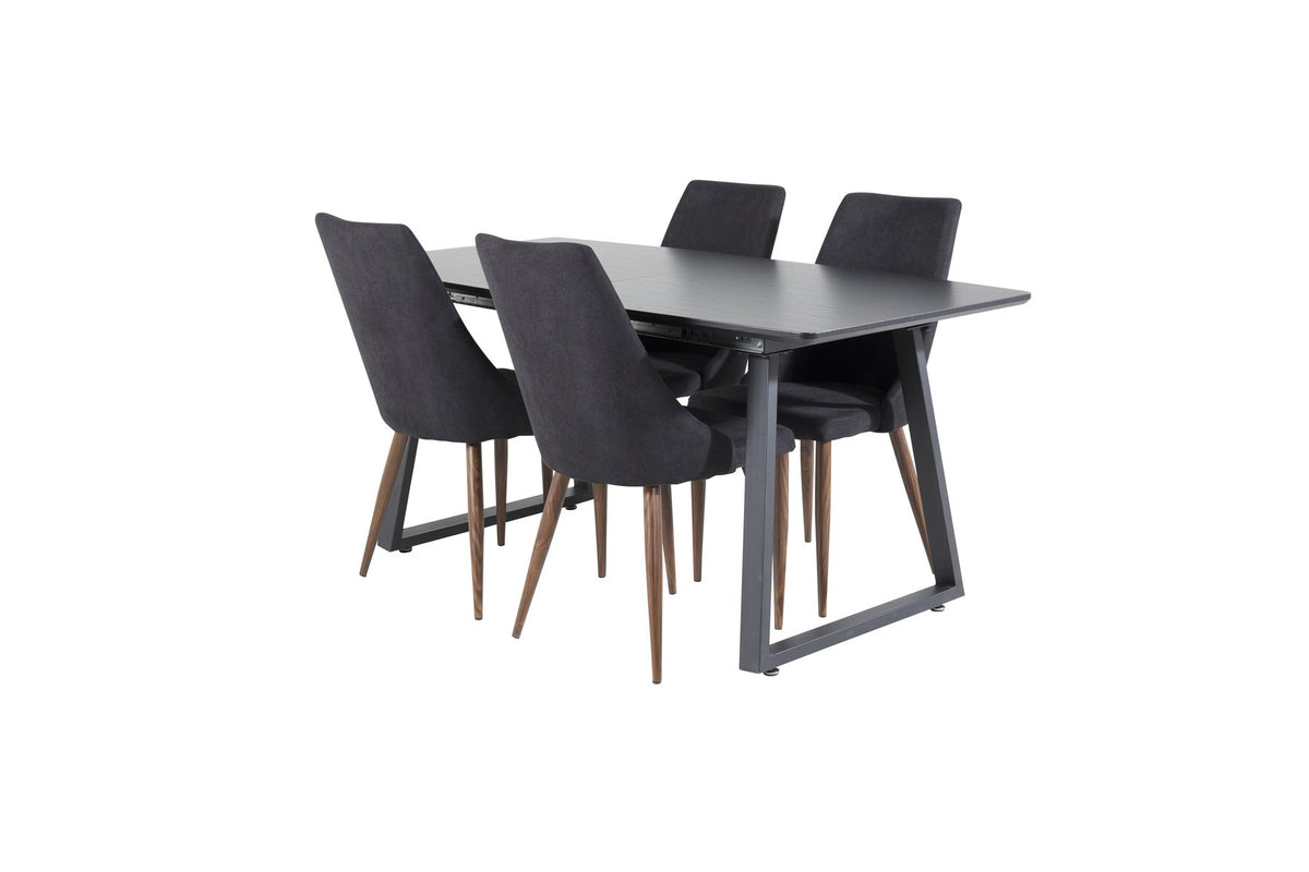 Zwei schwarze Esszimmerstühle mit Stahlbeinen und ausziehbarer schwarzer Esstisch mit MDF-Platte, Serie Leone & Inca von Venture Home.