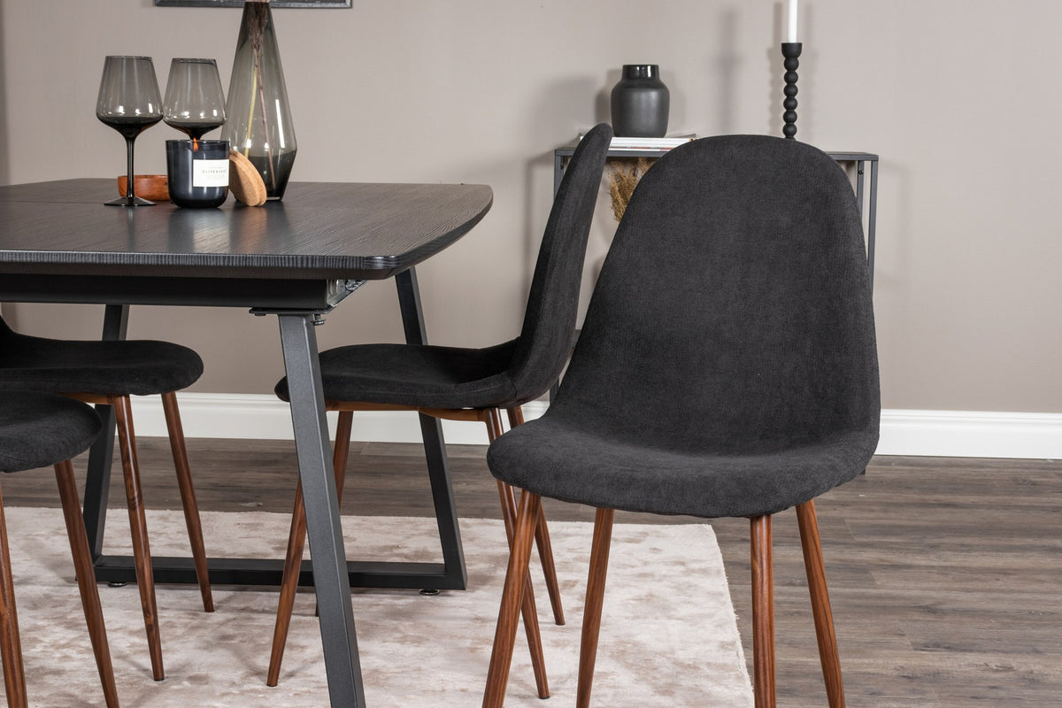 Schwarzes Inca Esszimmerset von Venture Home: ausziehbarer Tisch aus MDF, Sperrholz und Stahl mit sechs passenden Stühlen der Serie Polar