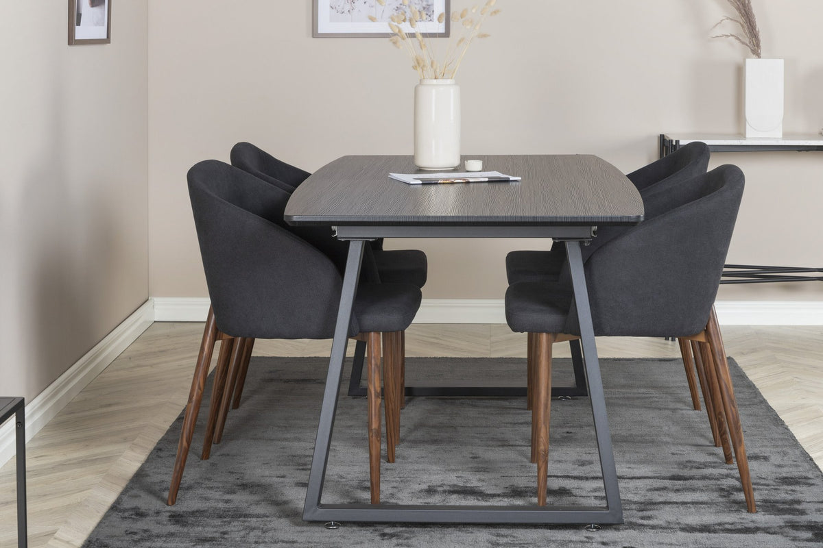 Schwarzes Esszimmerset: 2 Stühle aus MDF und Stahl mit Folienoberfläche sowie rechteckiger Esstisch mit Stahlbeinen, Tischplatte 160 x 85 cm.
