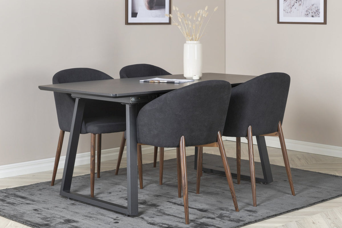 Schwarzes Esszimmerset: 2 Stühle aus MDF und Stahl mit Folienoberfläche sowie rechteckiger Esstisch mit Stahlbeinen, Tischplatte 160 x 85 cm.