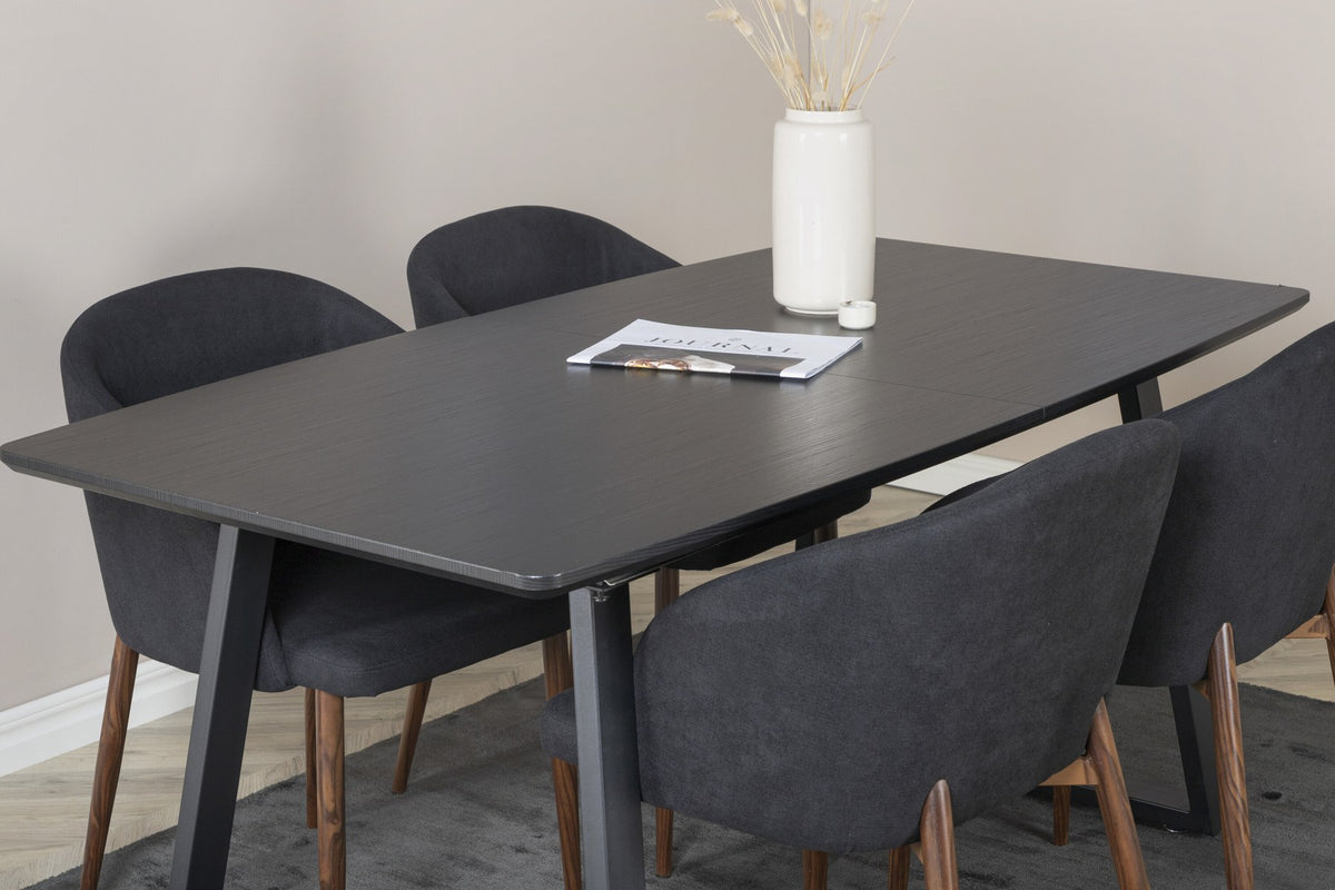 Schwarzes Esszimmerset: 2 Stühle aus MDF und Stahl mit Folienoberfläche sowie rechteckiger Esstisch mit Stahlbeinen, Tischplatte 160 x 85 cm.