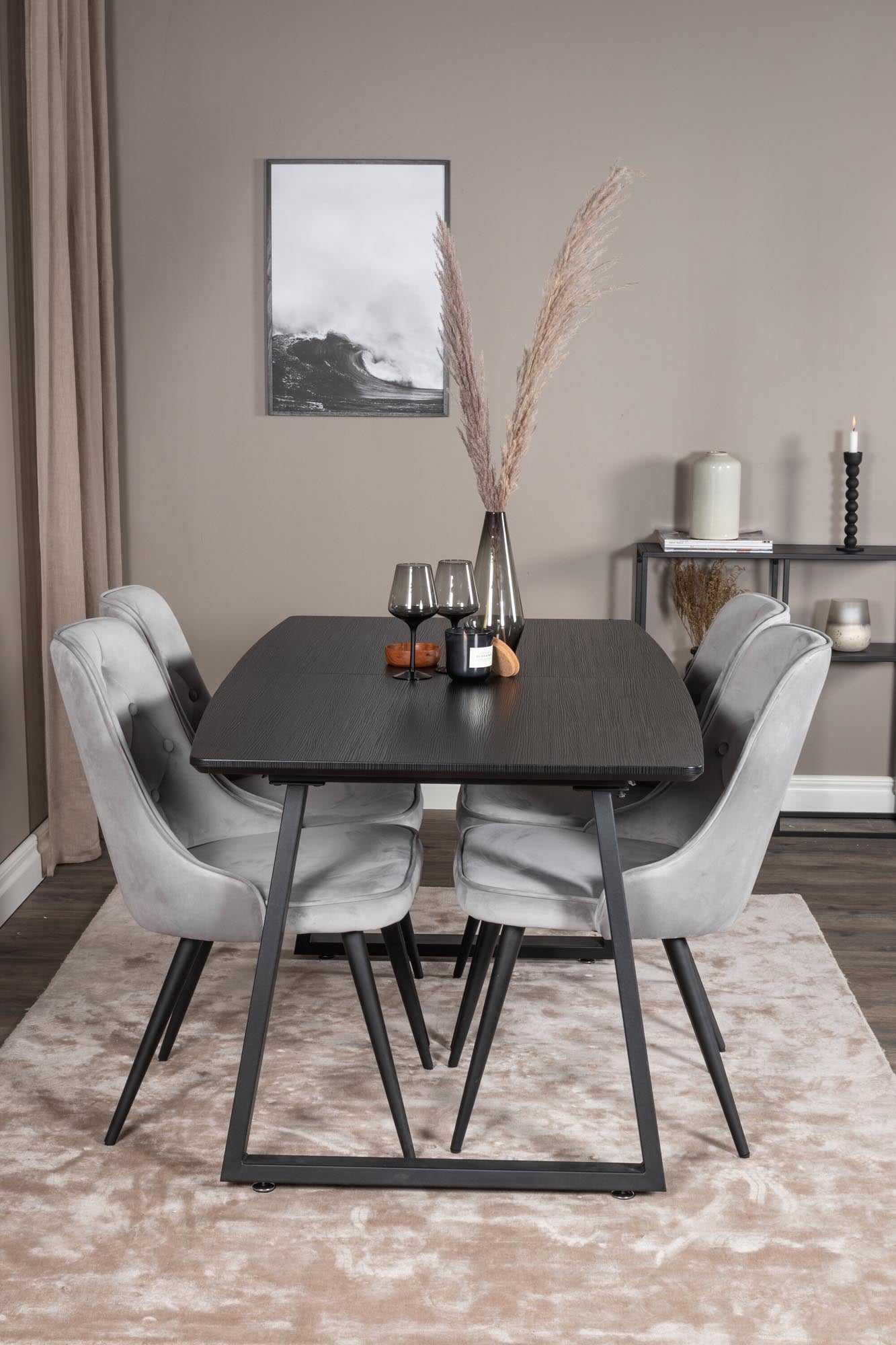 Entdecken Sie das Inca Esszimmerset von Venture Home: Ausziehbarer Tisch für bis zu 8 Personen, luxuriöse Samt-Stühle, ideal für festliche Anlässe.