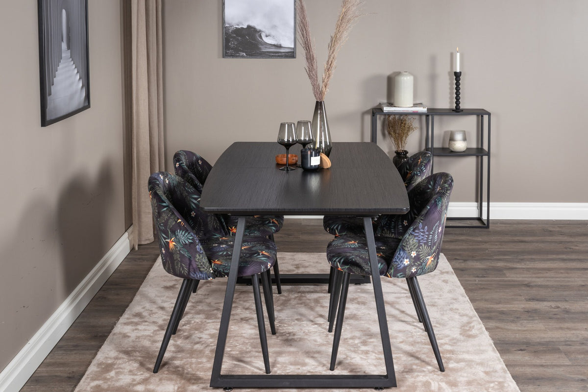 Esszimmerset Inca mit ausziehbarem Holztisch, schwarzer Tischplatte aus MDF und grauen Samtstühlen mit schwarzen Stahlbeinen der Serie Velvet.