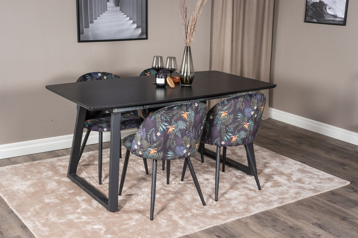 Esszimmerset Inca mit ausziehbarem Holztisch, schwarzer Tischplatte aus MDF und grauen Samtstühlen mit schwarzen Stahlbeinen der Serie Velvet.