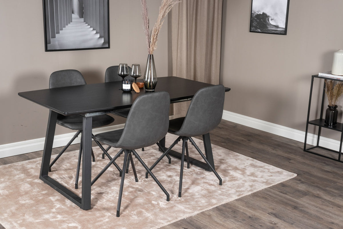 Schwarzes Inca Esszimmerset von Venture Home: ausziehbarer Tisch aus MDF, Sperrholz und Stahl mit sechs passenden Stühlen der Serie Polar