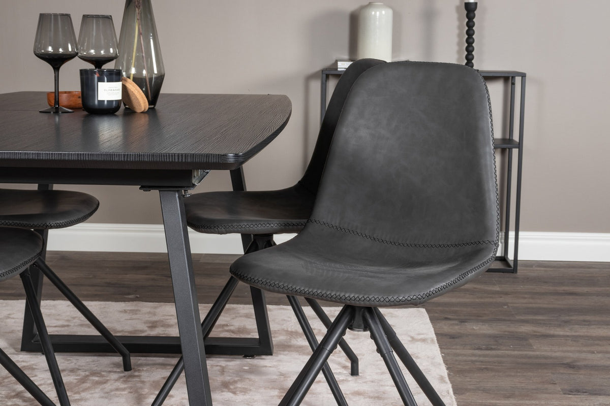 Schwarzes Inca Esszimmerset von Venture Home: ausziehbarer Tisch aus MDF, Sperrholz und Stahl mit sechs passenden Stühlen der Serie Polar