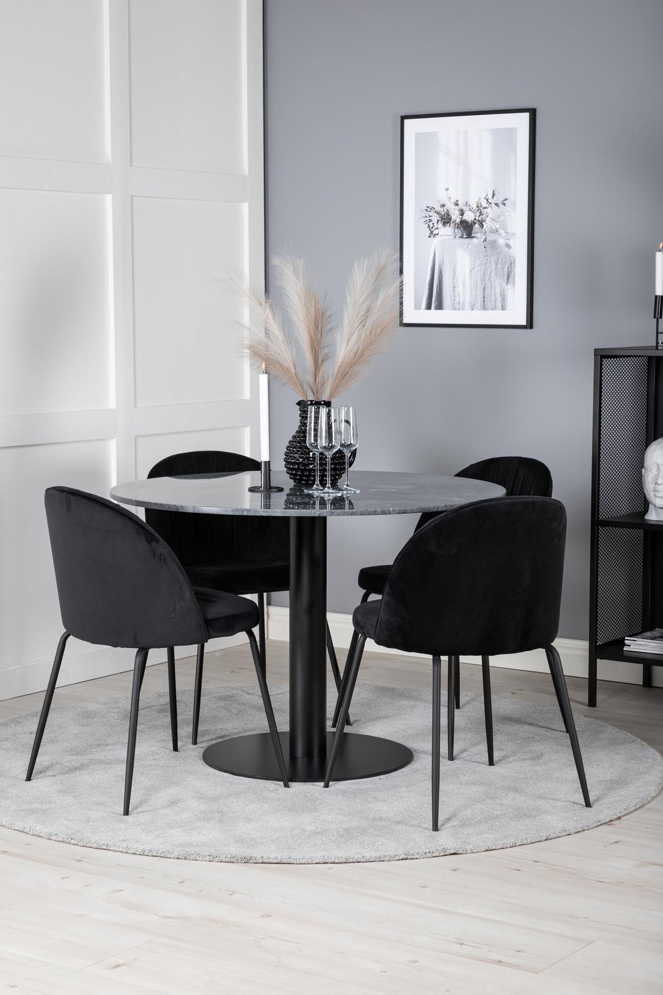 Erleben Sie das Estelle Esszimmerset + Wrinkles von Venture Home: Hochwertige Marmorplatte, bequeme Samtstühle und stilvolles, modernes Design für Ihr Zuhause.