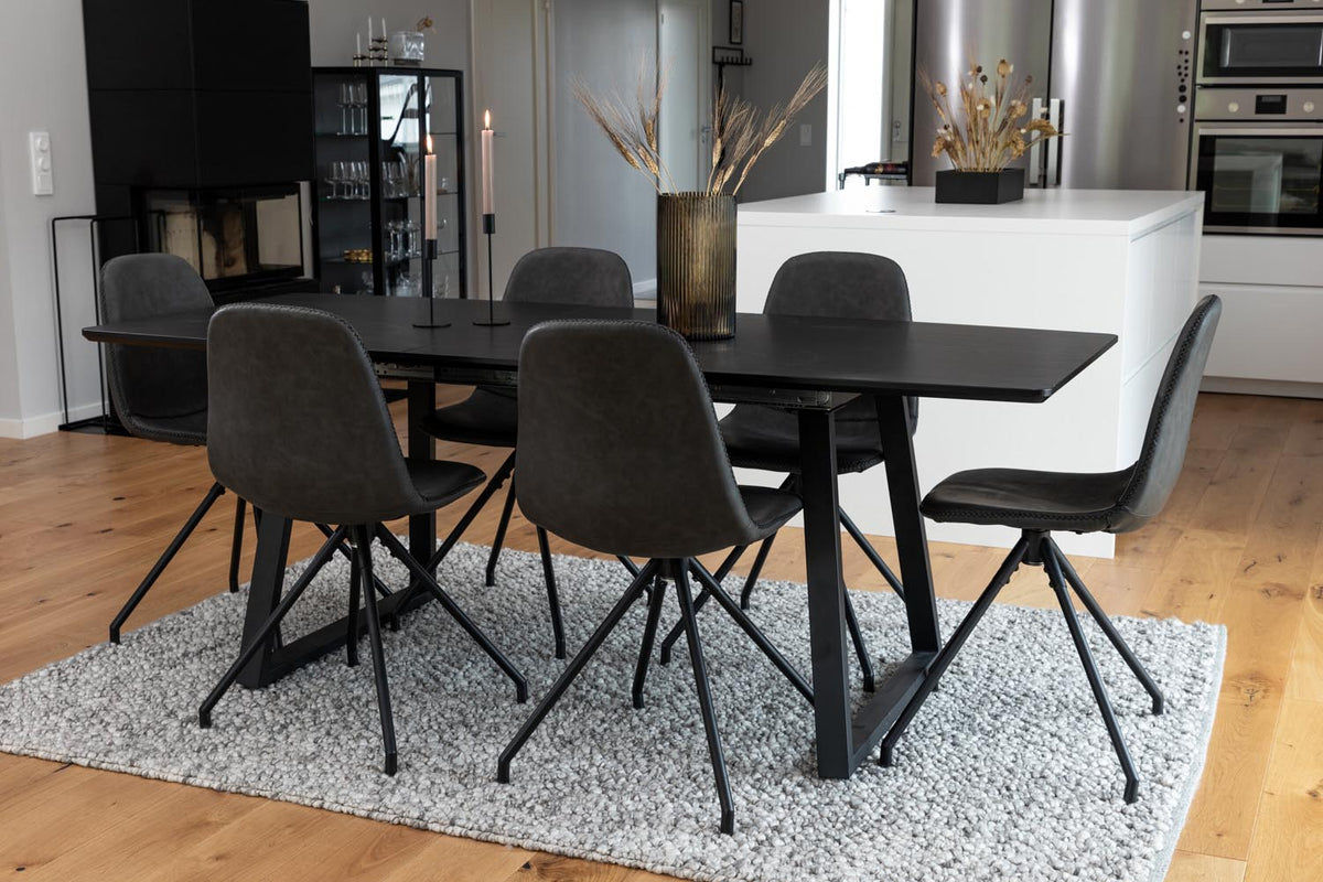Schwarzes Inca Esszimmerset von Venture Home: ausziehbarer Tisch aus MDF, Sperrholz und Stahl mit sechs passenden Stühlen der Serie Polar
