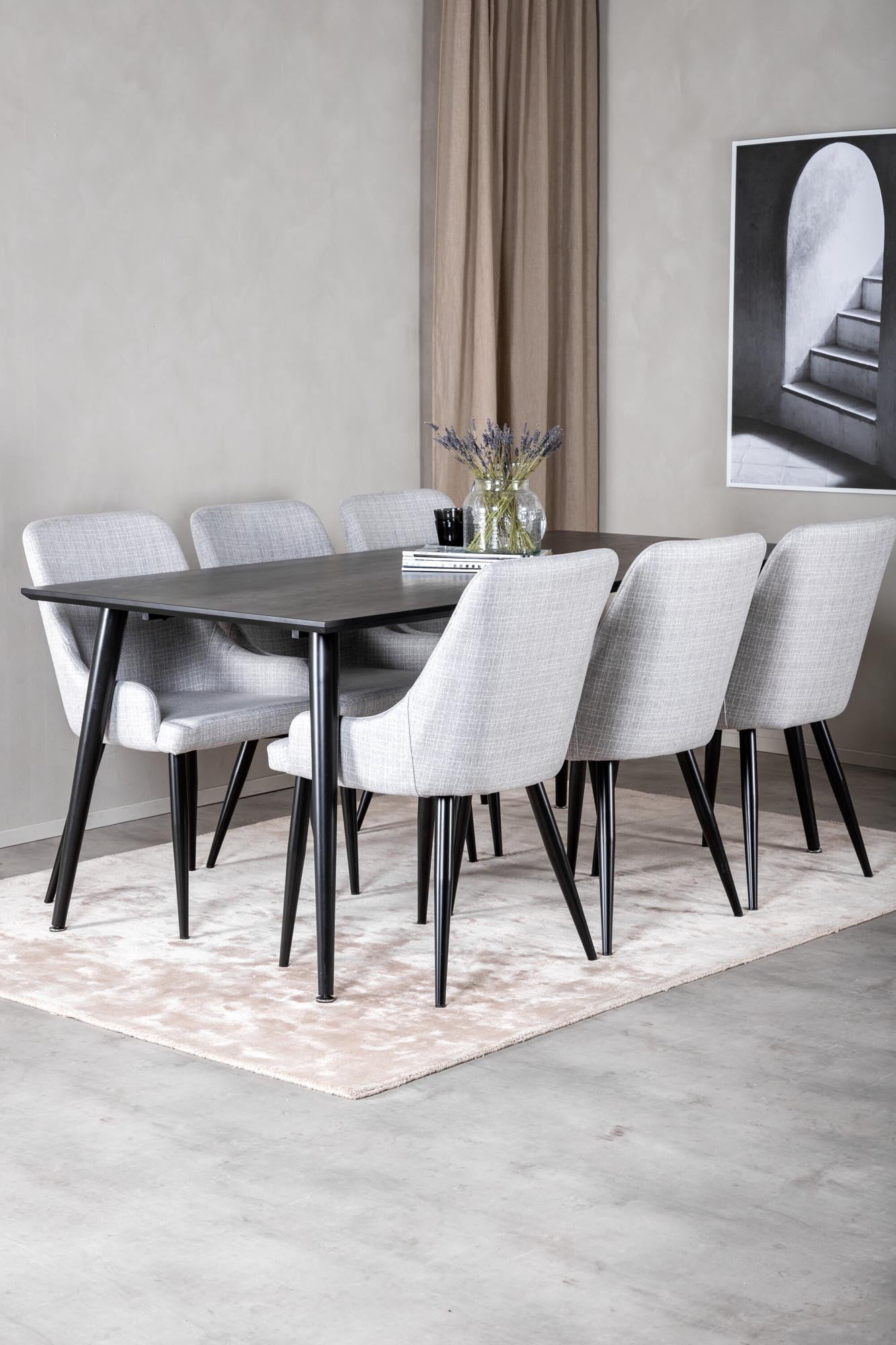 Entdecken Sie das Dipp Esszimmerset von Venture Home: Ein 180 cm langer Tisch und 6 stilvolle Stühle vereinen Komfort und Eleganz für Ihr Zuhause.