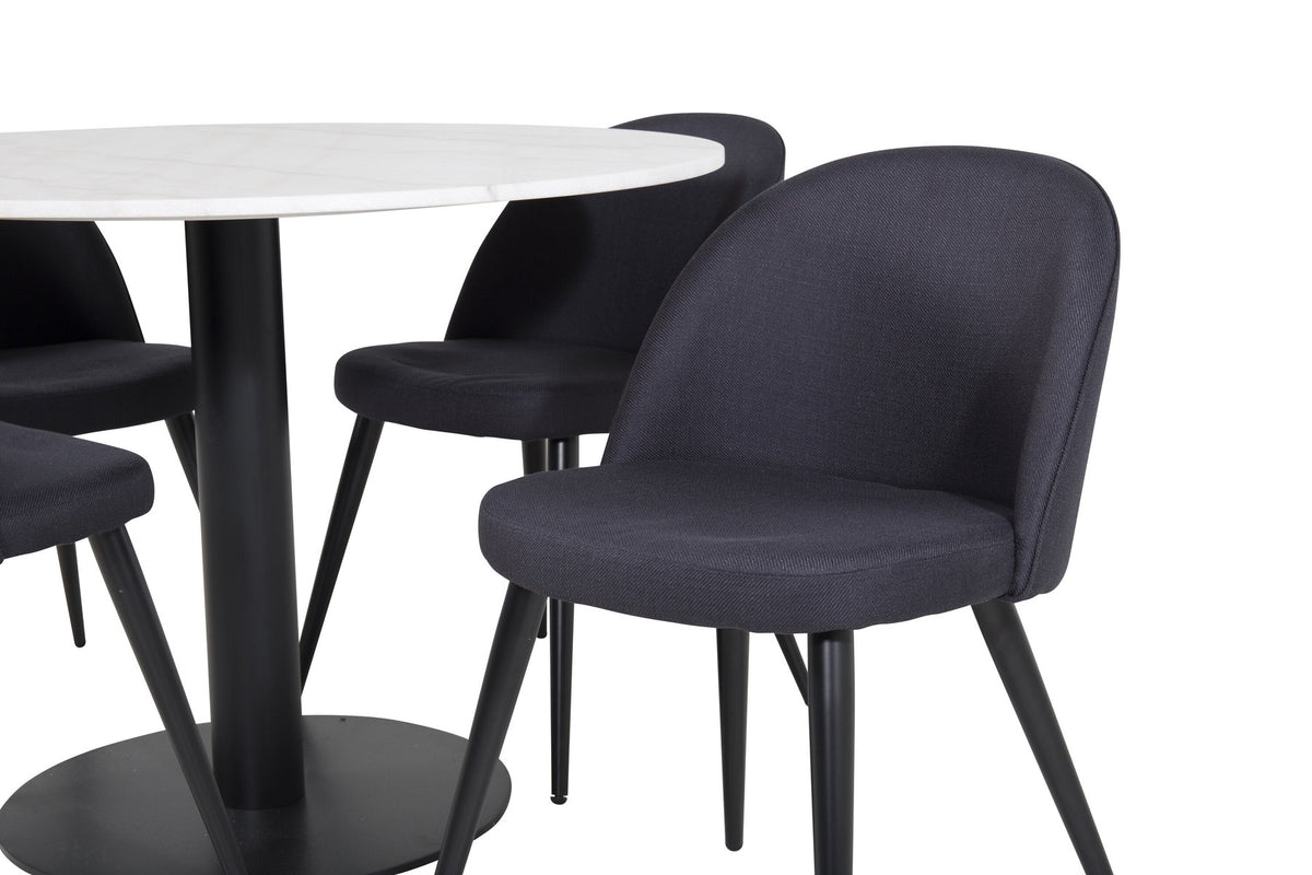 Esszimmertisch Estelle mit weisser Marmorplatte und Stahlgestell, dazu Samtstühle der Velvet-Serie mit schwarz pulverbeschichtetem Gestell