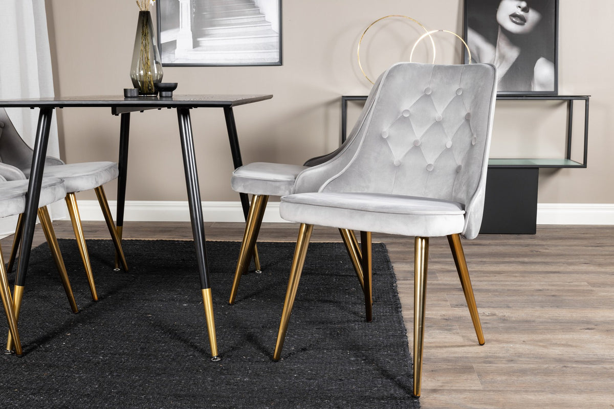 Esszimmerset Dipp & Velvet Deluxe von Venture Home: Esstisch mit schwarzer Tischplatte und Stahlbeinen, dazu vier Stühle in Grau.