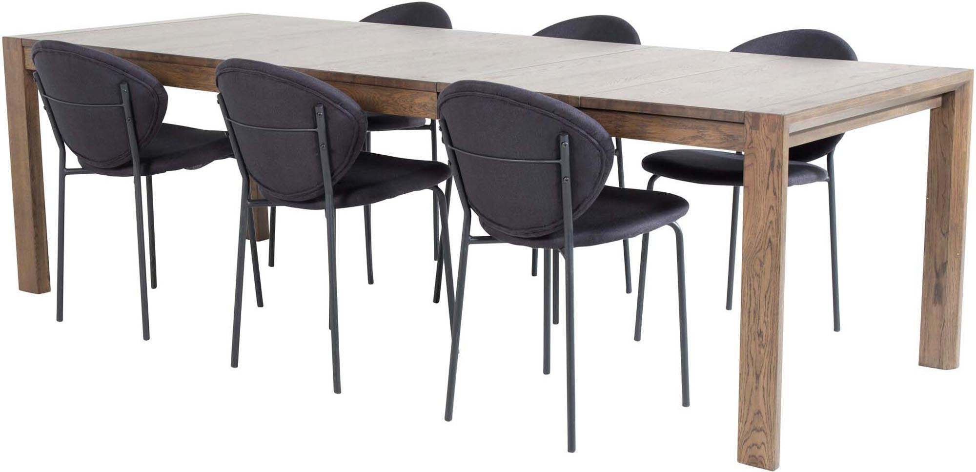 Erleben Sie das vielseitige Slider Esszimmerset von Venture Home: Ausziehbar, komfortable Vault-Stühle und elegantes Design für jeden Anlass.