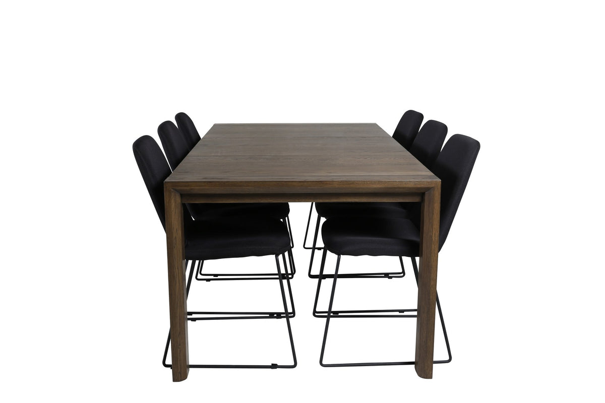 Esszimmerset mit ausziehbarem Eichentisch auf Stahlgestell und sechs schwarzen, gepolsterten Stühlen aus Polyesterstoff mit Metallbeinen.