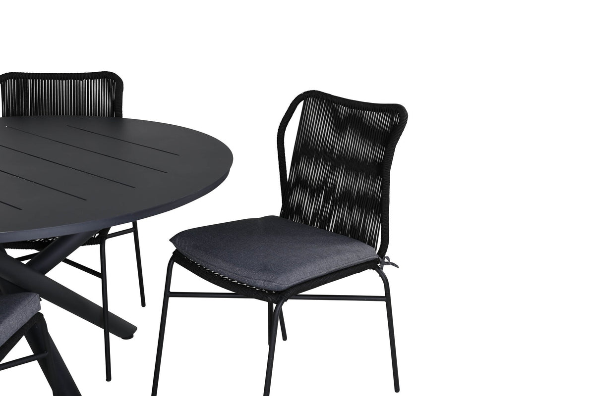 Runder Aluminium-Esstisch Ø120 cm in Schwarz mit Kreuzgestell und vier gepolsterten Esszimmerstühlen aus schwarzem Stahl, stapelbar, für den Outdoor-Bereich.