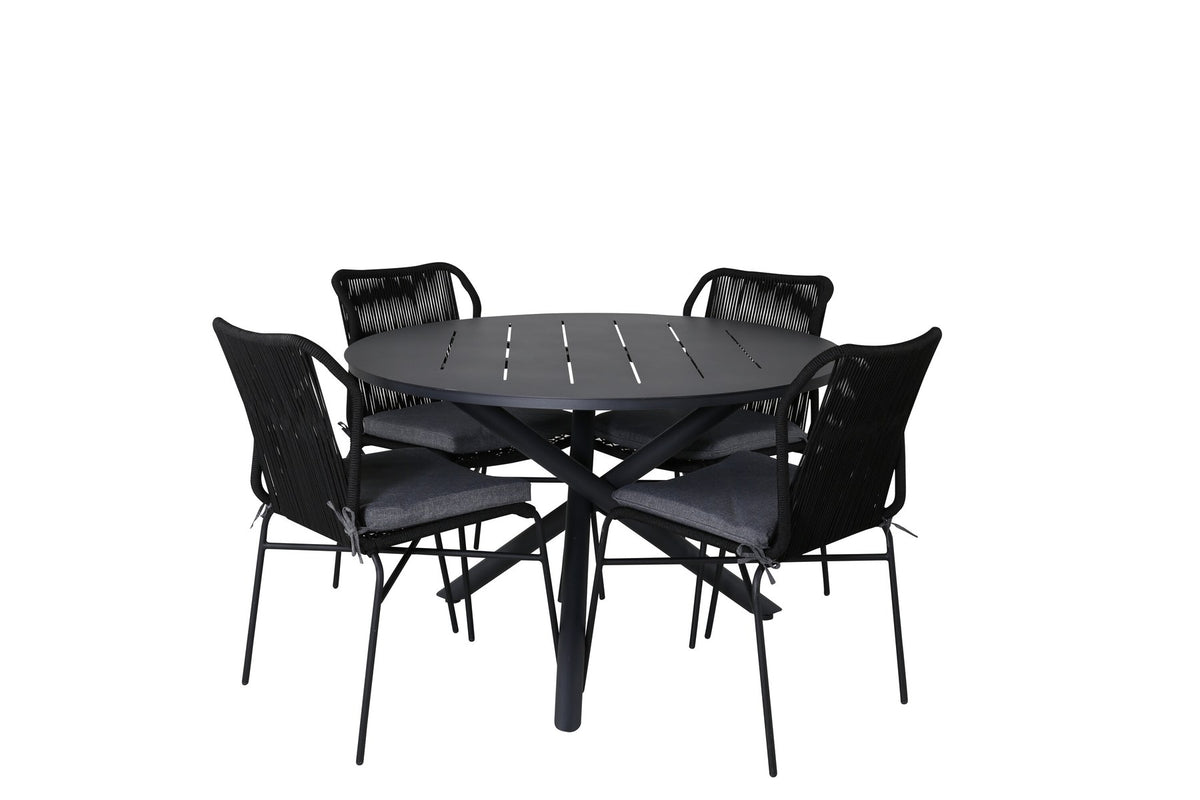 Runder Aluminium-Esstisch Ø120 cm in Schwarz mit Kreuzgestell und vier gepolsterten Esszimmerstühlen aus schwarzem Stahl, stapelbar, für den Outdoor-Bereich.