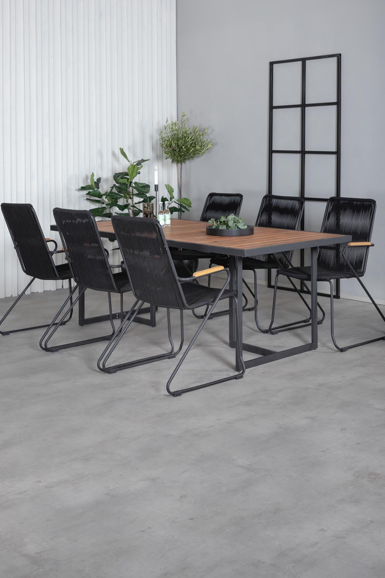 Elegantes Gartentisch-Set mit rechteckigem Tisch und Holzdetails, ideal für stilvolle Aussenbereiche.