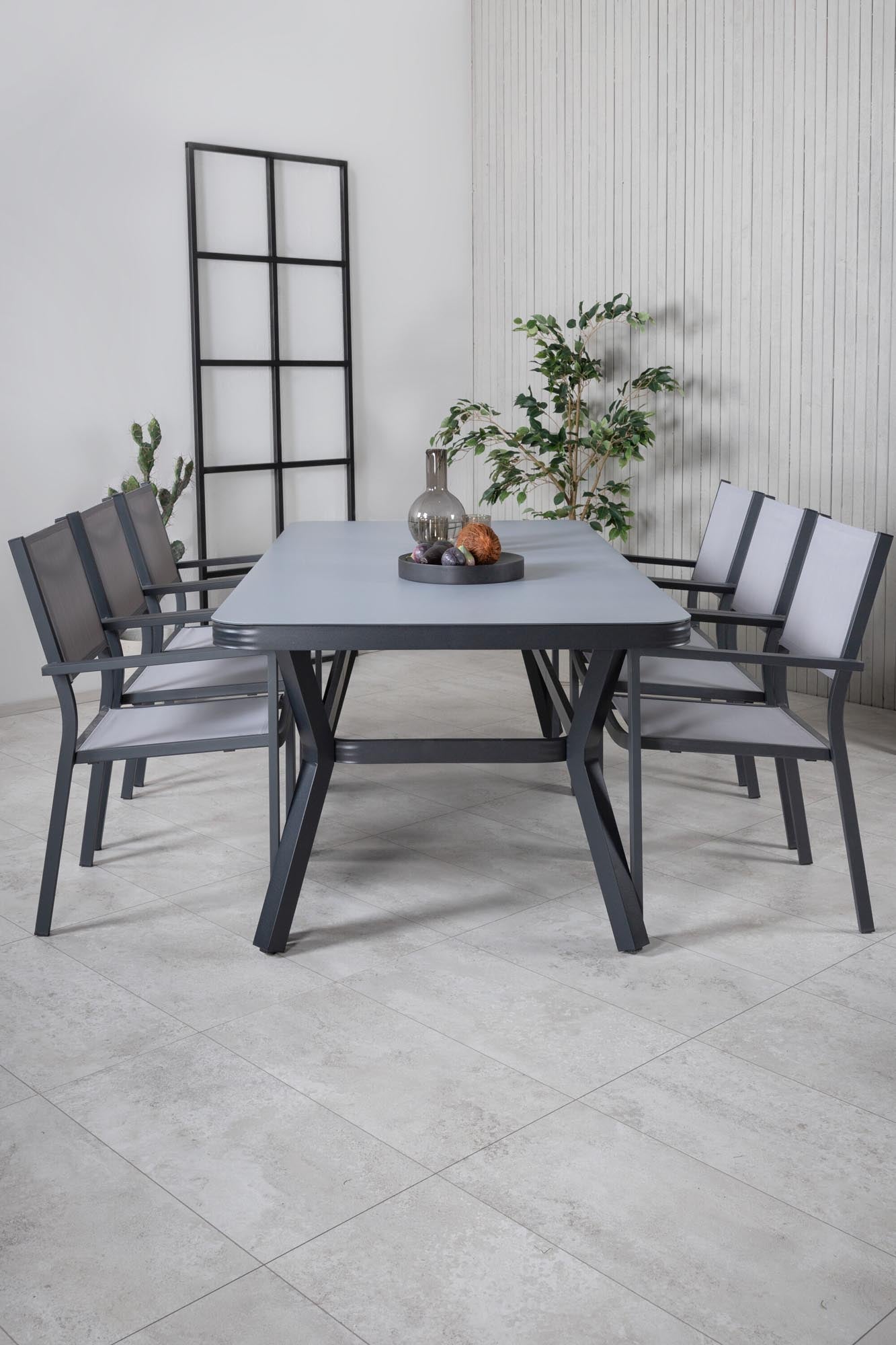 Virya Gartentisch Set mit 6 Stühlen in Schwarzgrau präsentiert im Onlineshop von KAQTU Design AG. Gartentischset ist von Venture Home