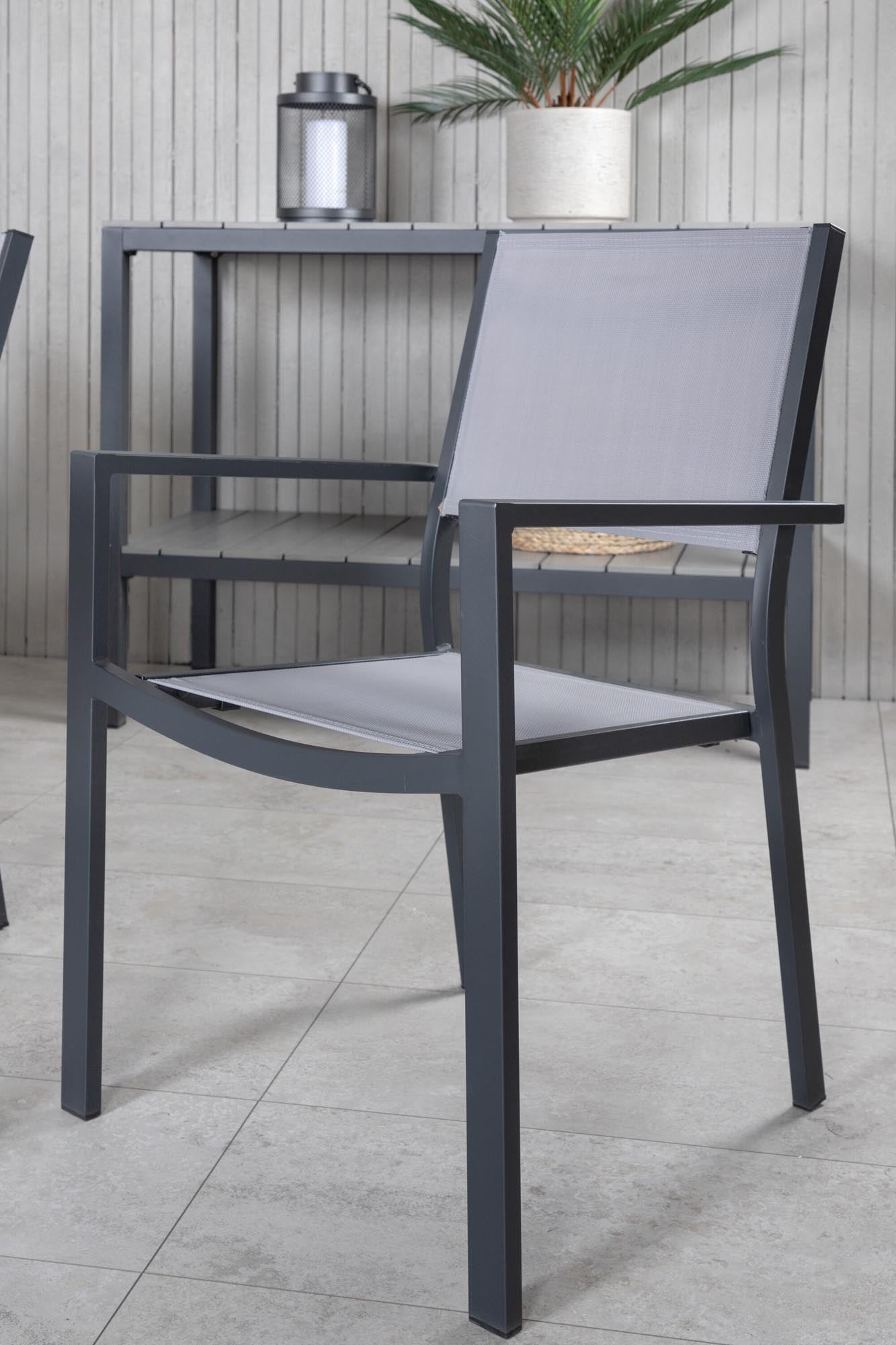 Virya Gartentisch Set mit 6 Stühlen in Schwarzgrau präsentiert im Onlineshop von KAQTU Design AG. Gartentischset ist von Venture Home