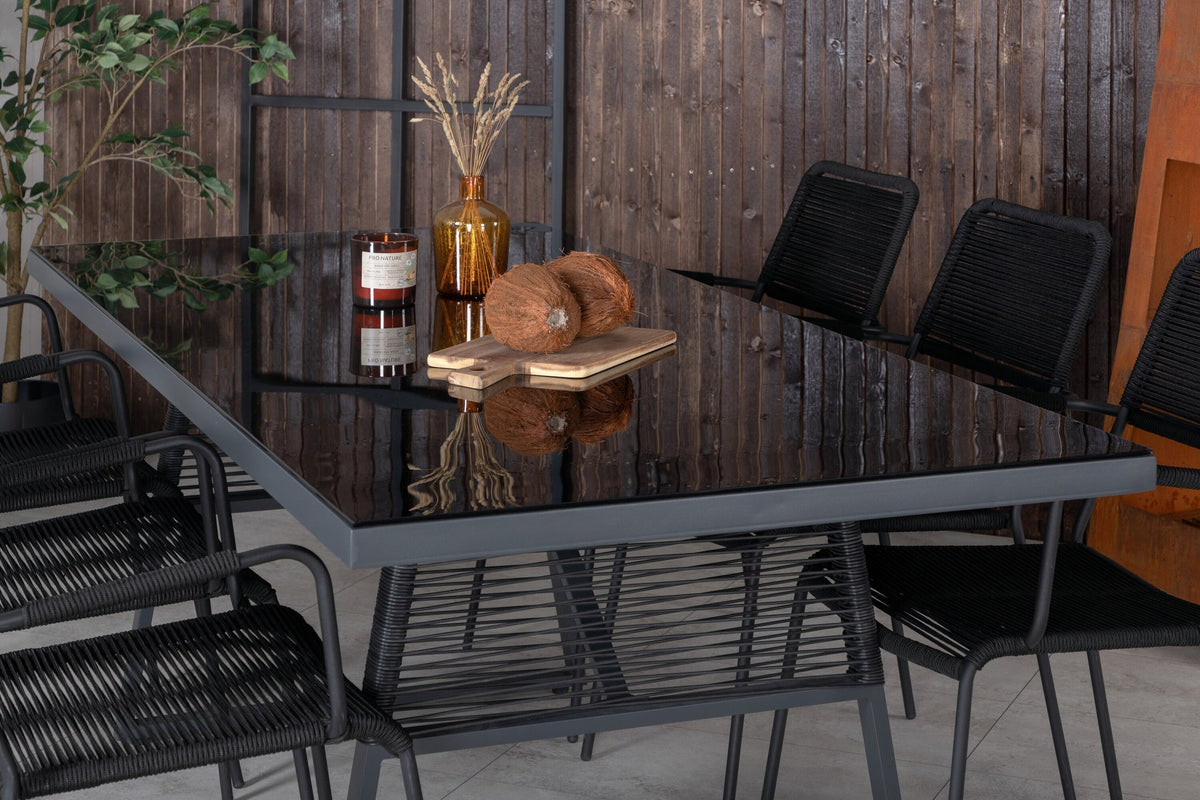 Esstisch Dallas mit sechs Stühlen Lindos, Gestell aus Aluminium und Geflecht in Schwarz, Tischplatte aus Glas, Outdoor-Set von Venture Home.