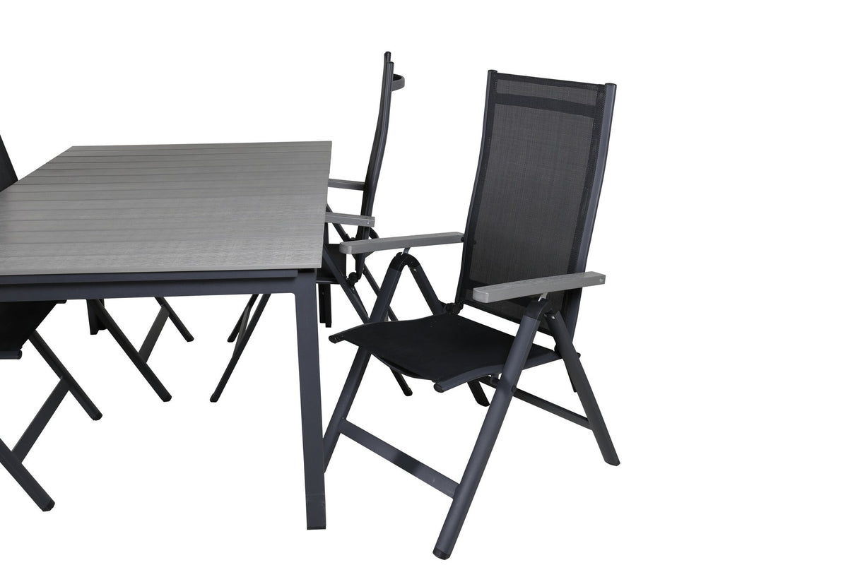 Schwarzer Albany-Stuhl mit grauem Teakholz und Textilene neben ausziehbarem Levels Gartentisch aus Aluminium und Aintwood in Schwarz/Grau
