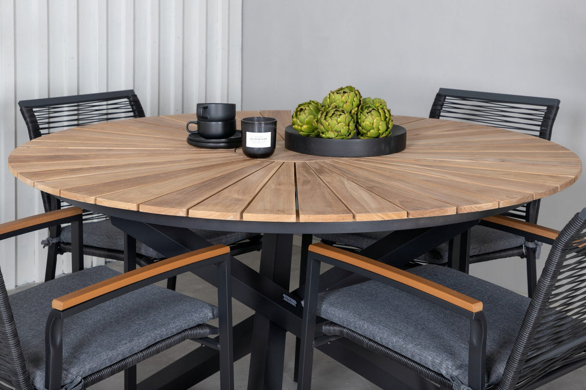 Schwarzes Gartentischset: runder Teakholz-Tisch mit ⌀140cm auf Stahlbeinen und zwei Aluminium-Stühle mit Polyesterbezug von Venture Home.