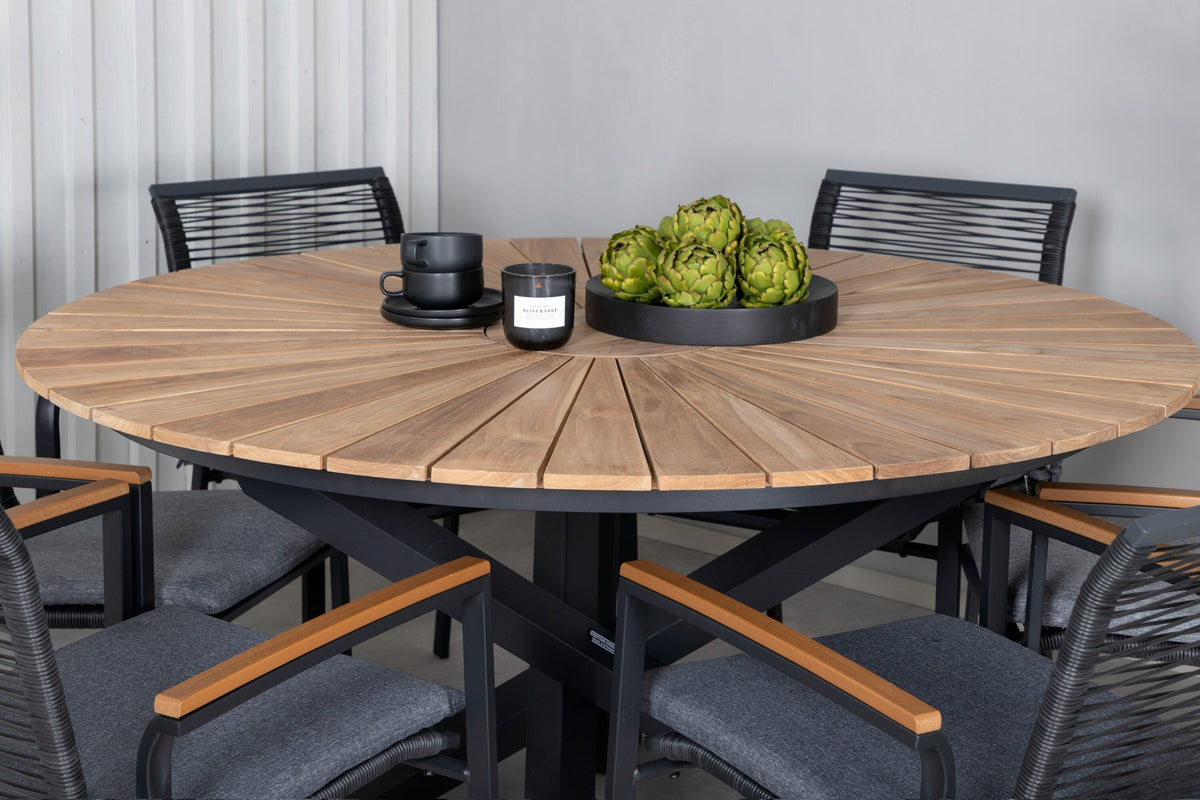Schwarzes Gartentischset: runder Teakholz-Tisch mit ⌀140cm auf Stahlbeinen und zwei Aluminium-Stühle mit Polyesterbezug von Venture Home.