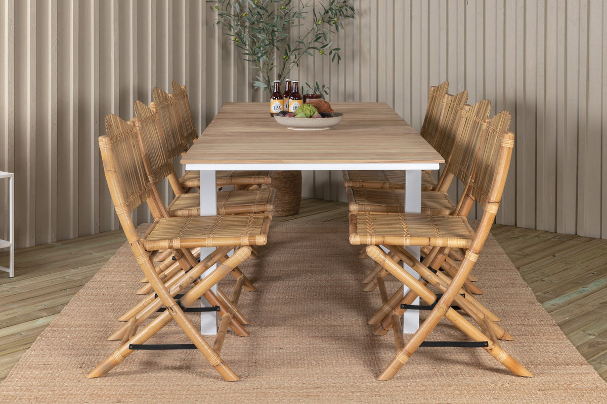 Gartentischset Cane & Mexico von Venture Home: Teakholz-Tisch mit Rattan-Beinen und Aluminium-Stühle in Natur, ausziehbar auf 240 cm.