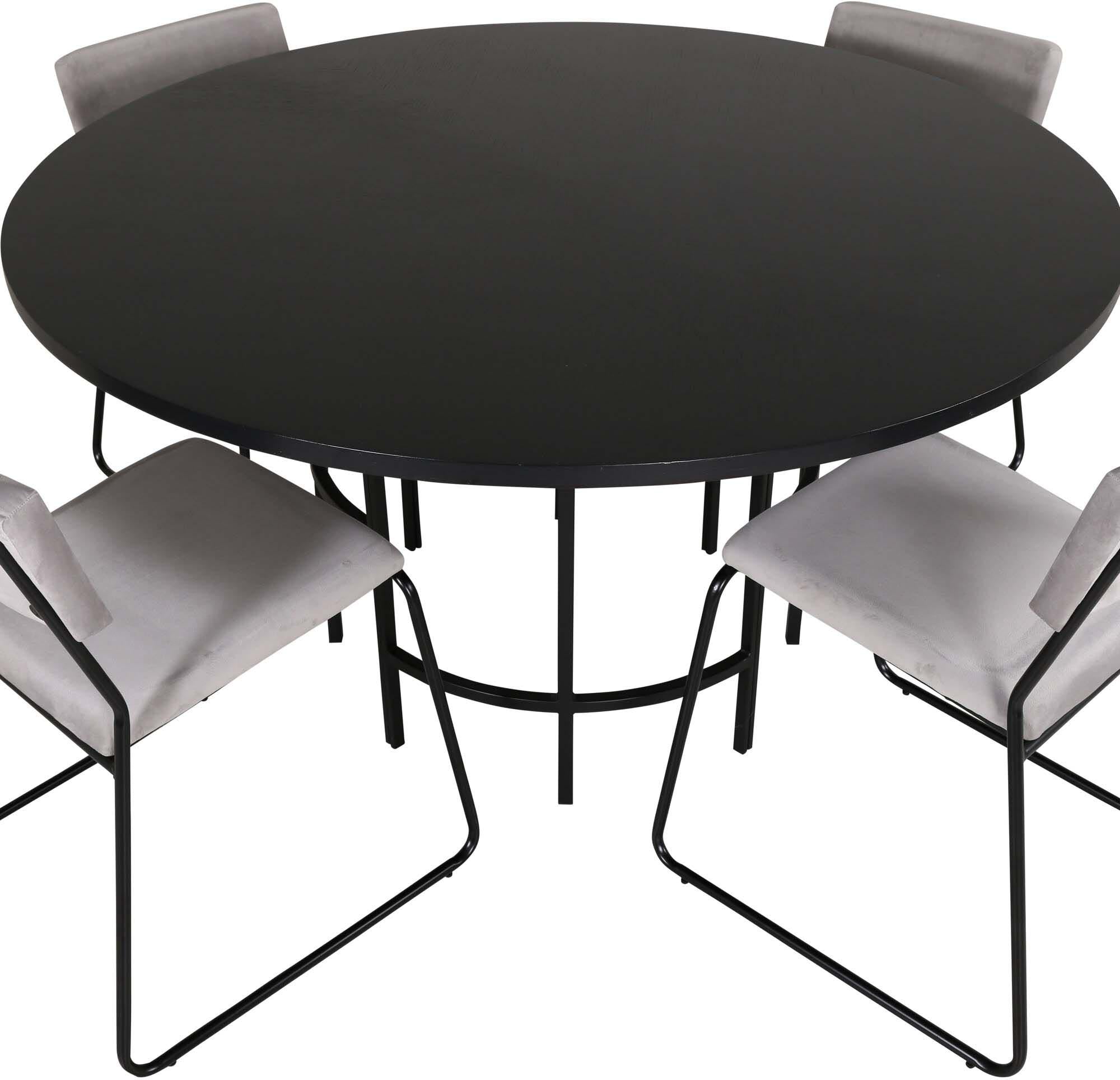 Modernes Esszimmerset mit Industrie-Charme: Tisch und Stühle vereinen Komfort und Stil für gesellige Abende.