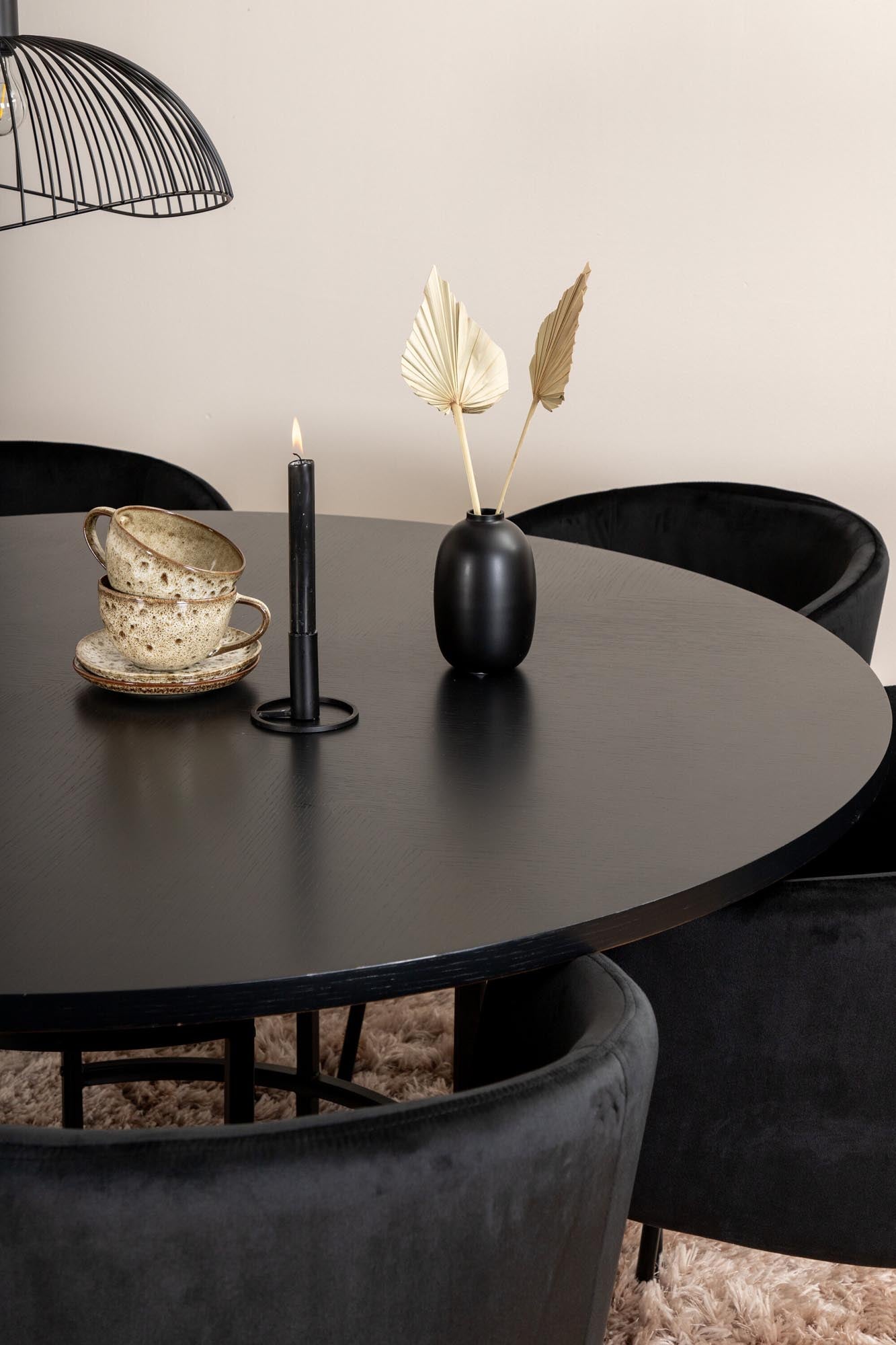 Modernes Esszimmerset mit 140 cm rundem Tisch und 6 bequemen Stühlen. Ideal für stilvolle Essbereiche und gesellige Abende.