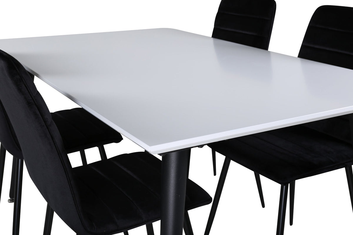 Rechteckiger Esstisch mit weisser HPL/MDF-Platte und schwarzen Stahlbeinen neben zwei schwarzen Esszimmerstühlen mit Bugholzgestell und Polstersitz.