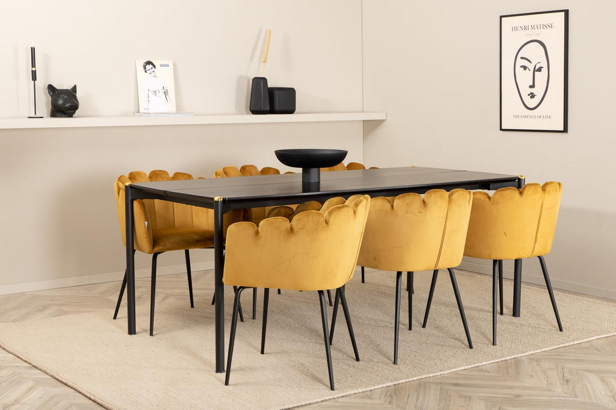 Schwarzer Esstisch aus MDF mit Furnier und Metallbeinen, kombiniert mit sechs Stühlen mit gelbem Samtbezug und schwarzen Metallbeinen.