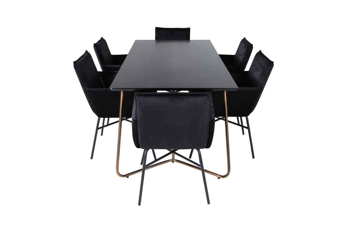 Petra Esszimmerset: Esstisch mit schwarzer MDF-Platte und Furnier in Used-Optik, sechs Stühle mit Samtbezug in Kupfer/Schwarz und Eisenbeinen.