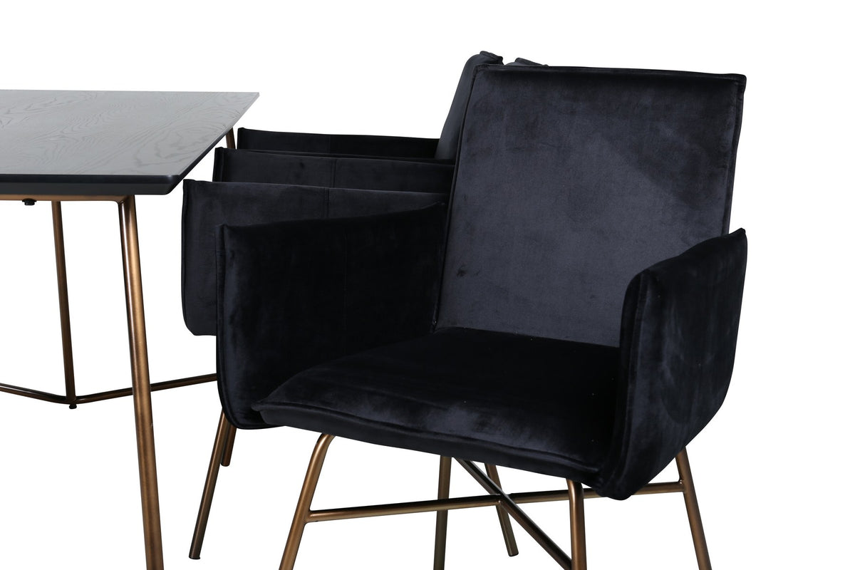 Petra Esszimmerset: Esstisch mit schwarzer MDF-Platte und Furnier in Used-Optik, sechs Stühle mit Samtbezug in Kupfer/Schwarz und Eisenbeinen.
