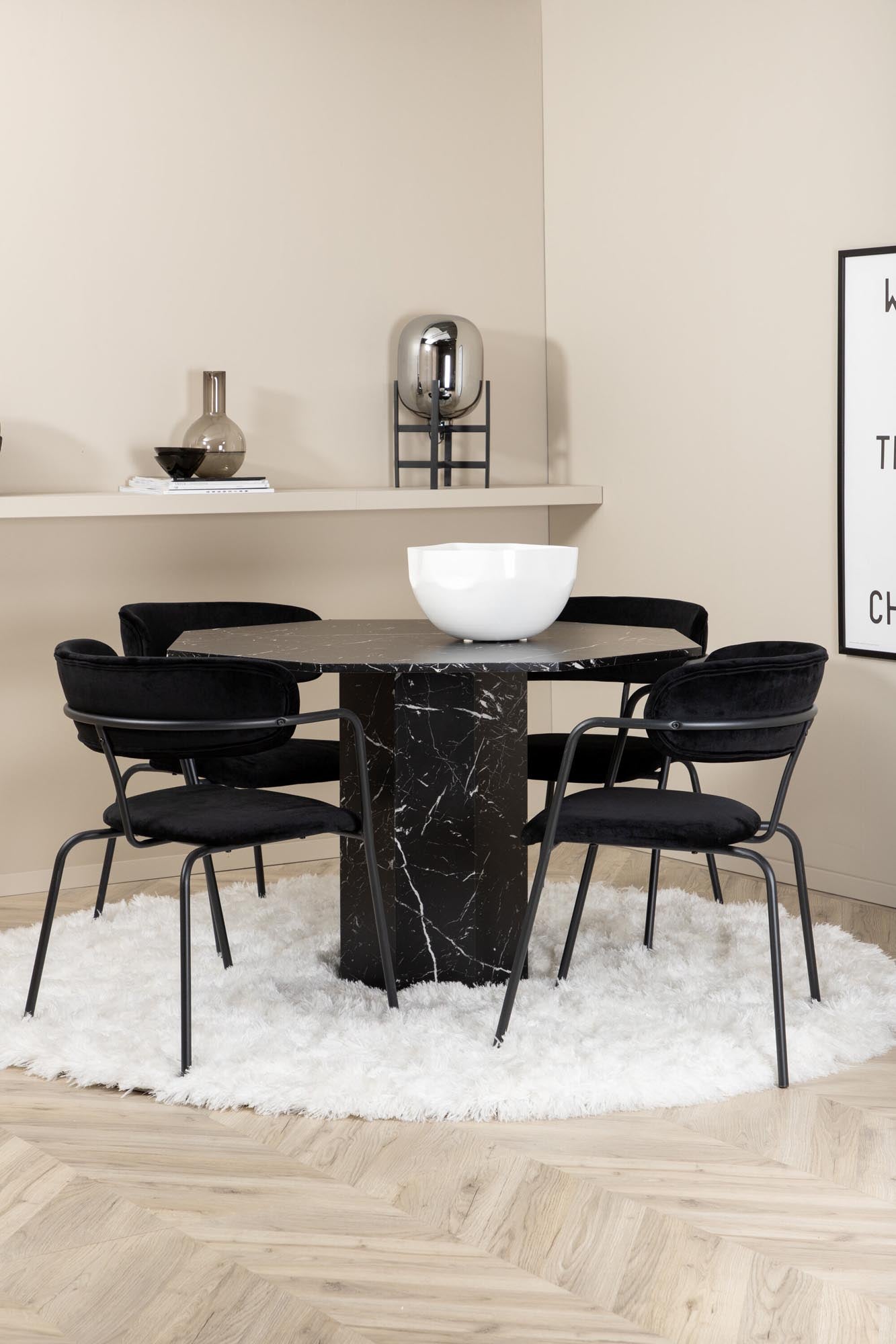 Modernes Esszimmerset mit schwarzem Marmorglas-Tisch und eleganten Samtstühlen für stilvolle Dinner.