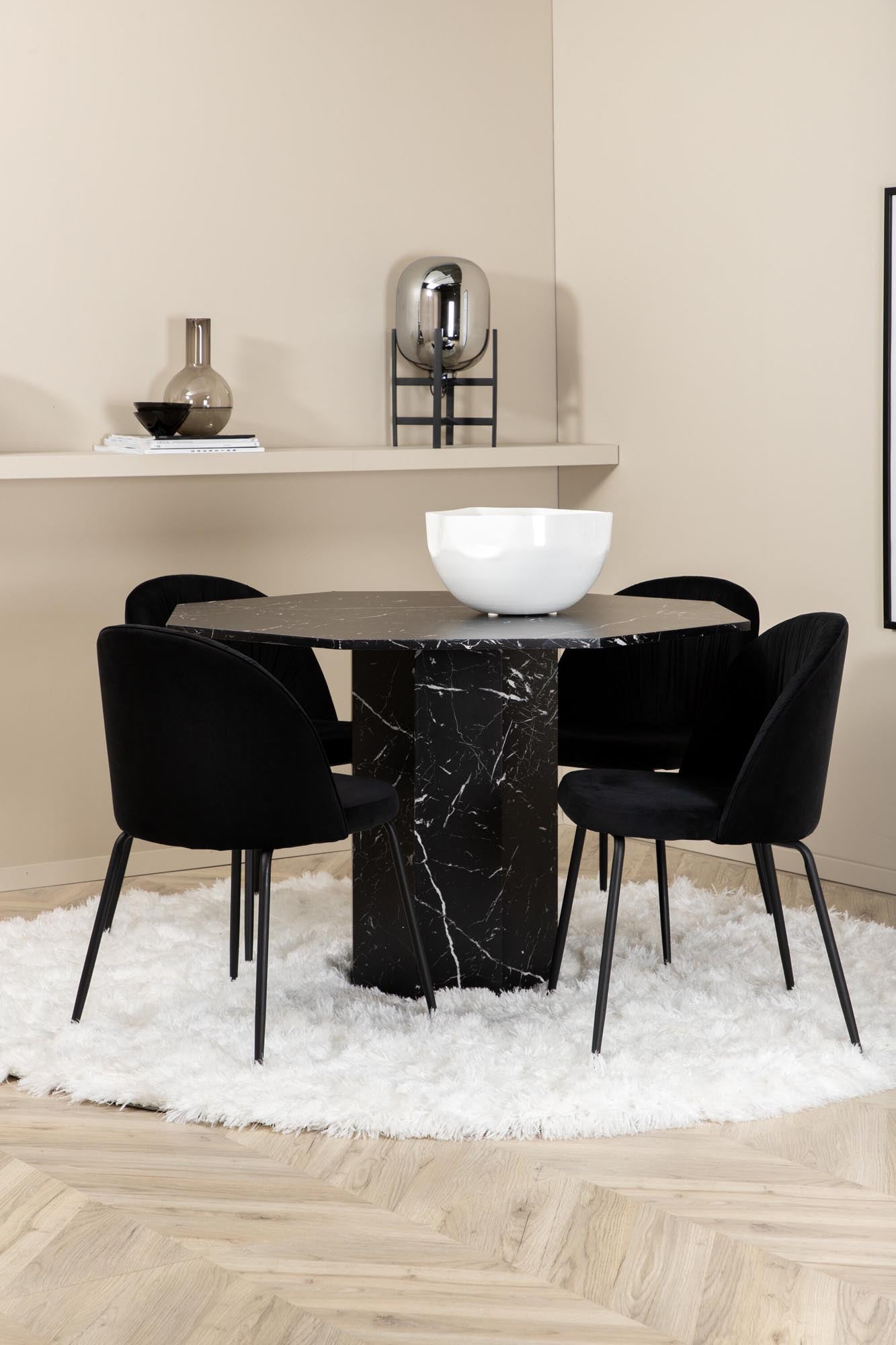 Stilvolles Marbs Esszimmerset mit edler Marmorglasplatte und bequemen Samtstühlen. Ideal für gesellige Abende und elegante Einrichtung.