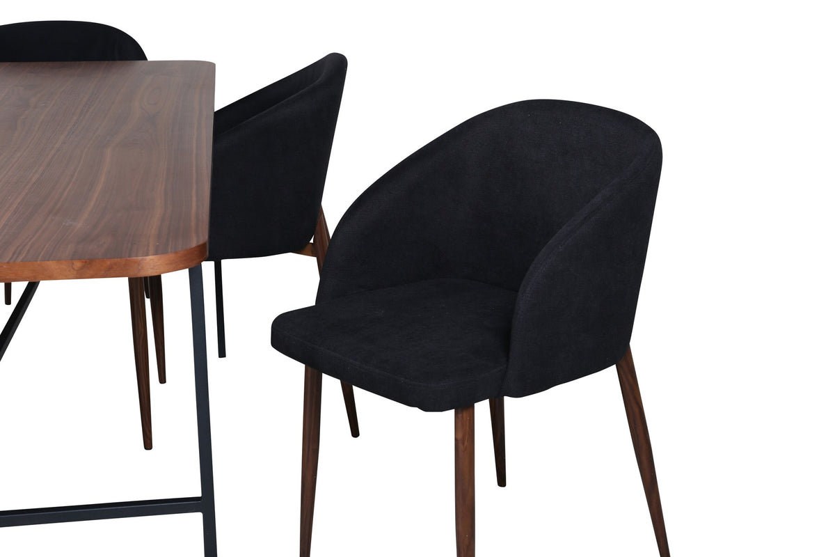 Esszimmerset Uno: rechteckiger Tisch mit MDF-Furnier-Platte in Nussbaum und schwarzem Stahlgestell, dazu Arch Stühle mit Polyesterbezug.